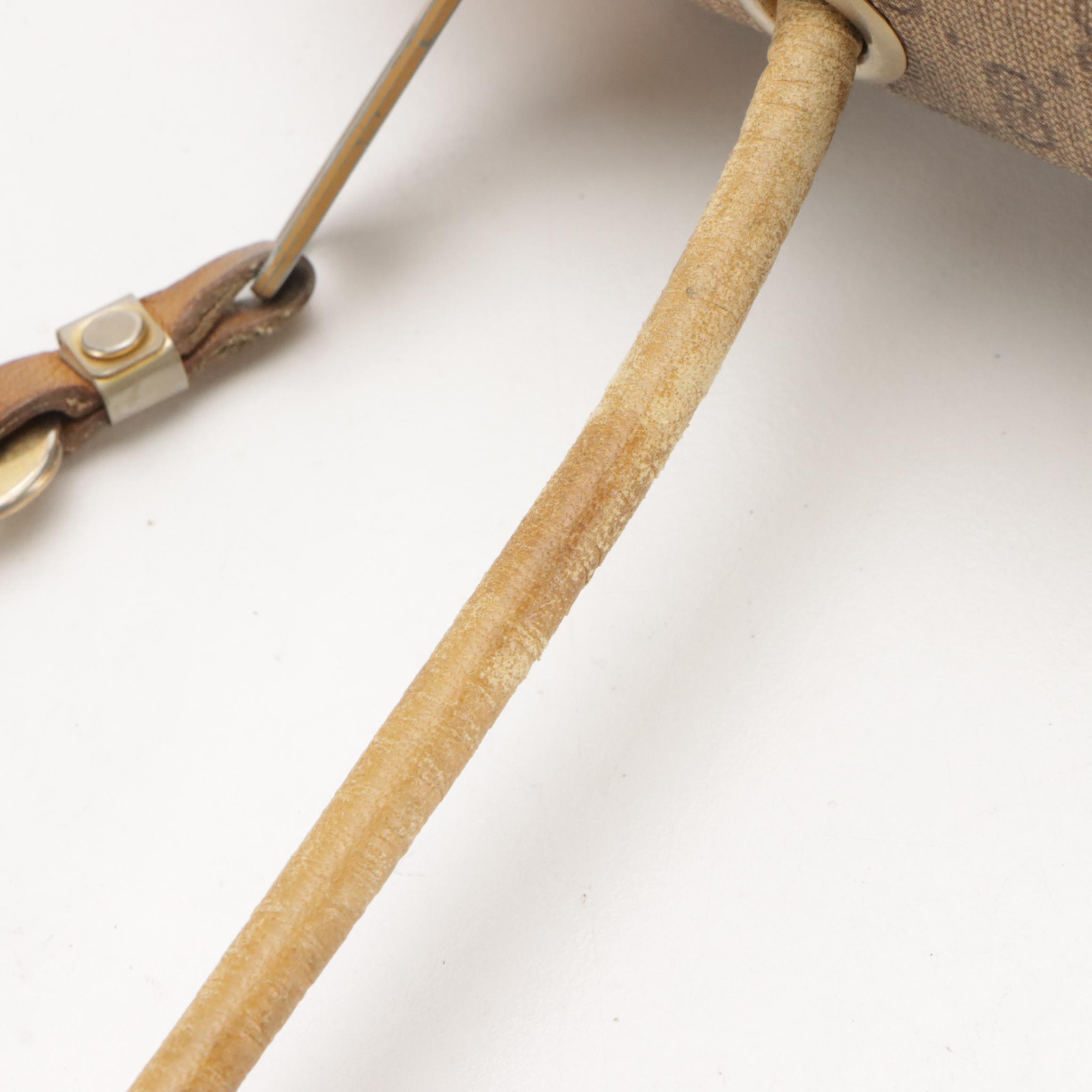 Gucci Zippered Crossbody Bag in Micro GG Supreme Canvas and Leather Trim