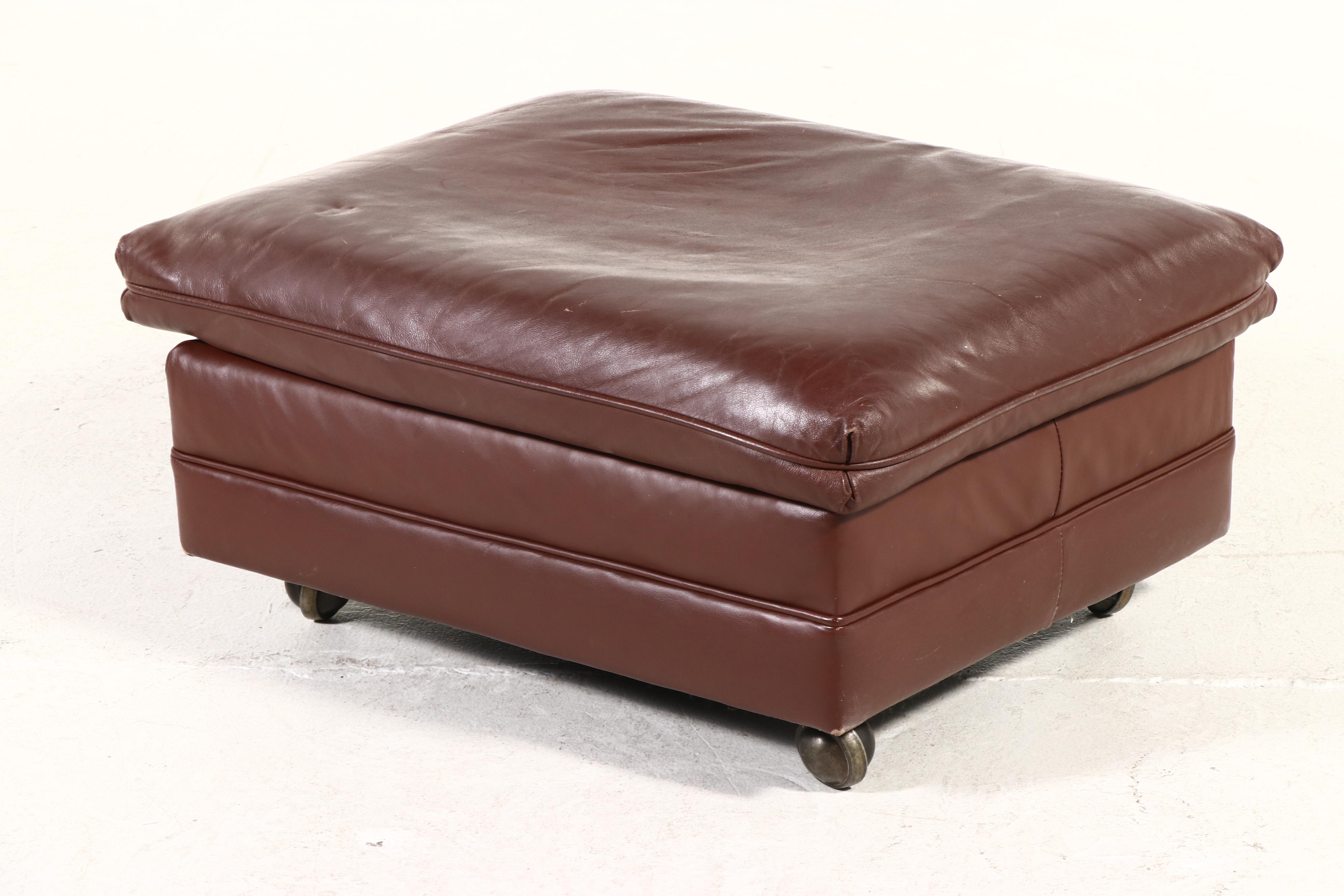 Hancock & Moore Brown Leather Armchair and Ottoman, Late 20th Century