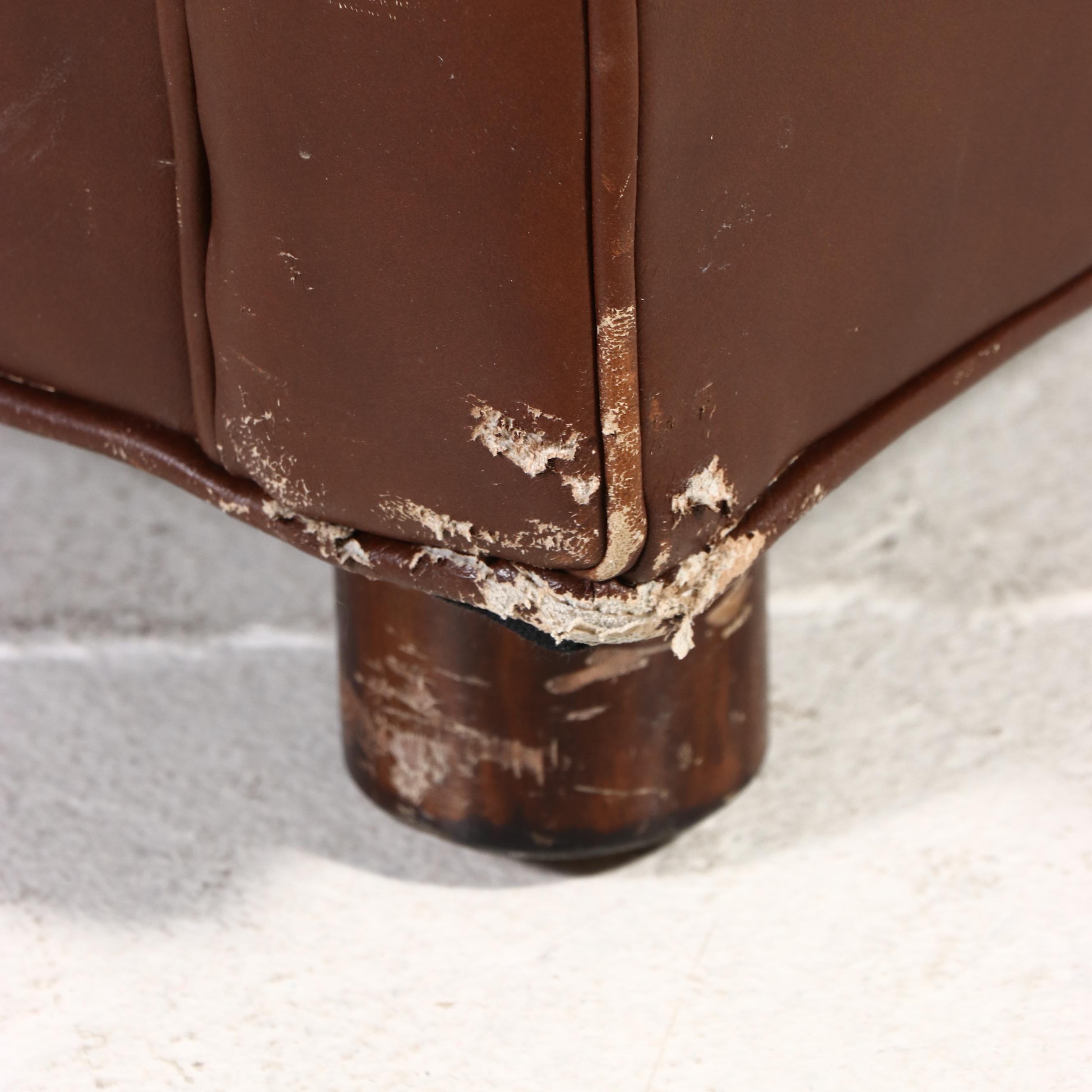 Hancock & Moore Brown Leather Armchair and Ottoman, Late 20th Century