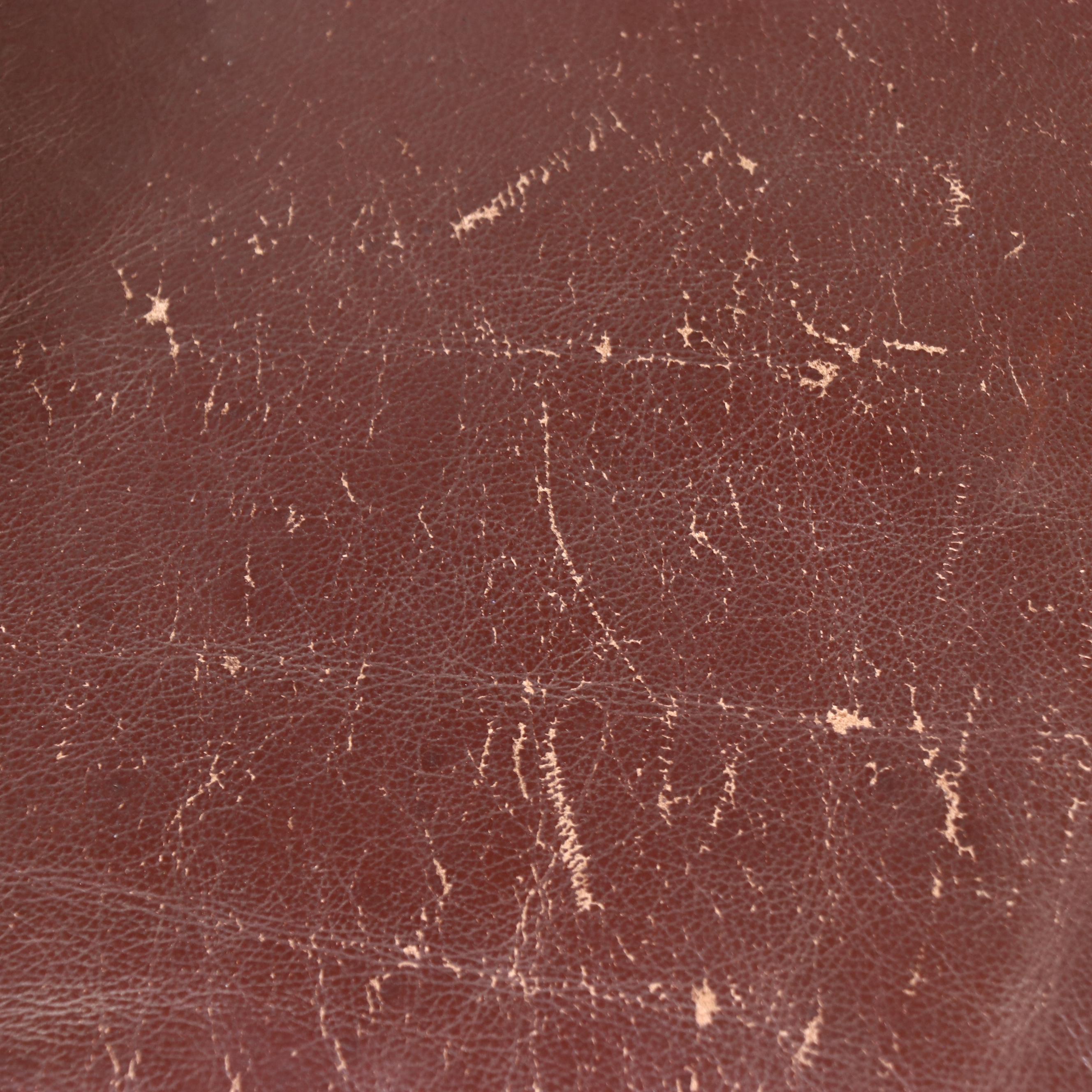 Hancock & Moore Brown Leather Armchair and Ottoman, Late 20th Century