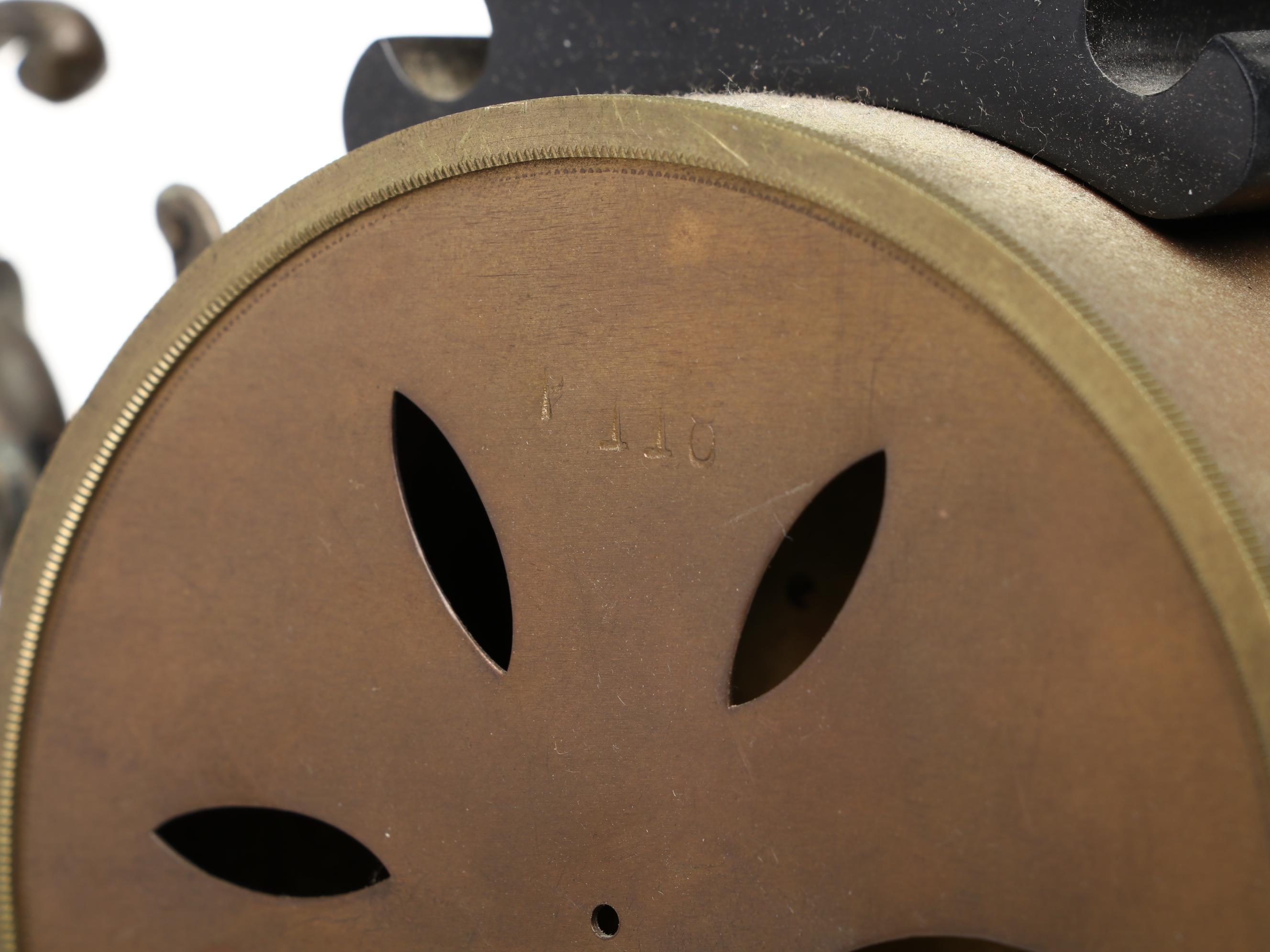 Ornate French Style Bronze and Marble Mantel Clock with Cupid Motif