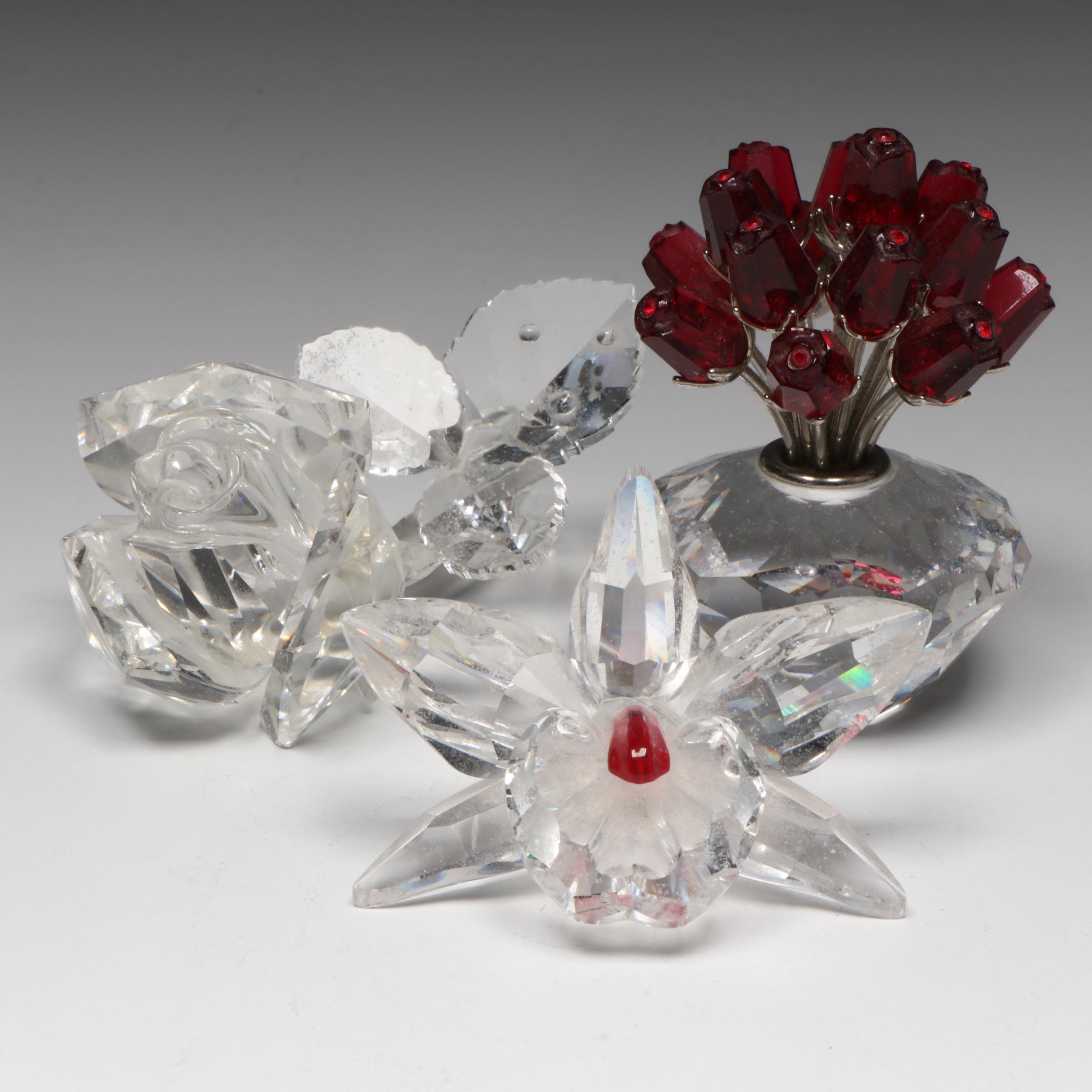 Swarovski "Vase of Roses," "The Rose," and "Orchid Blossom" Crystal Figurines