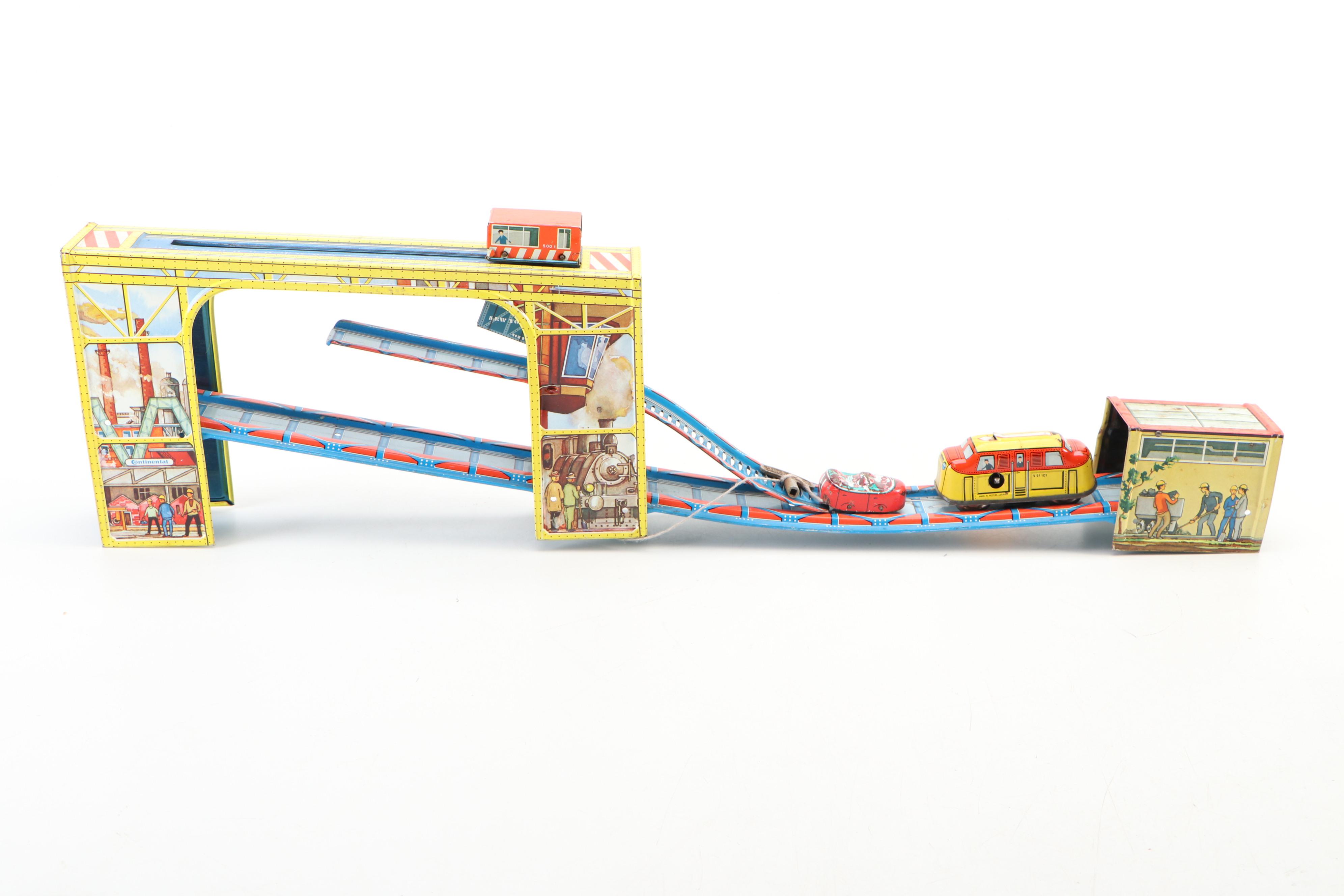 J. Chein Tin Litho Wind-Up Roller Coaster with Technofix Silver Mine Toy