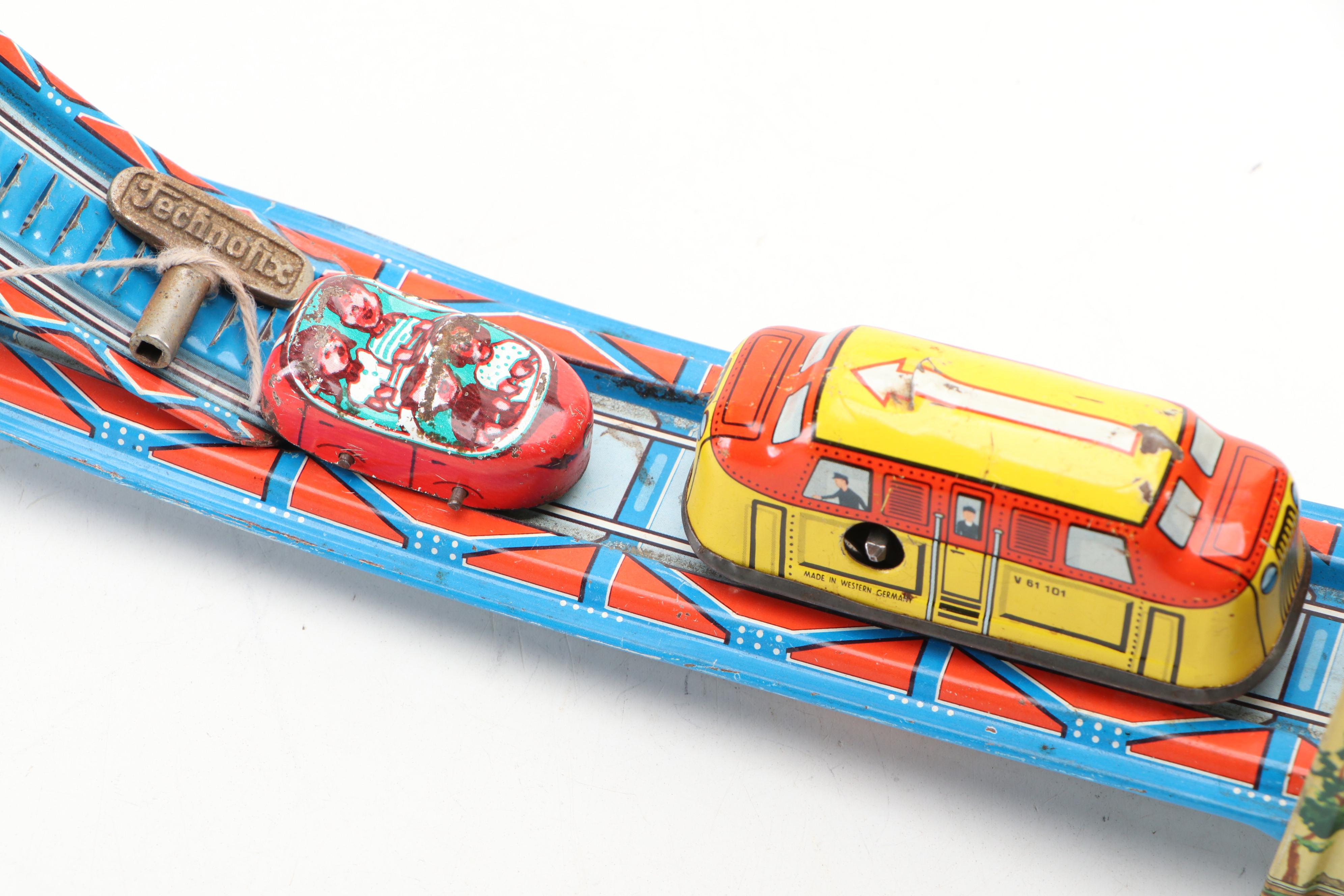 J. Chein Tin Litho Wind-Up Roller Coaster with Technofix Silver Mine Toy