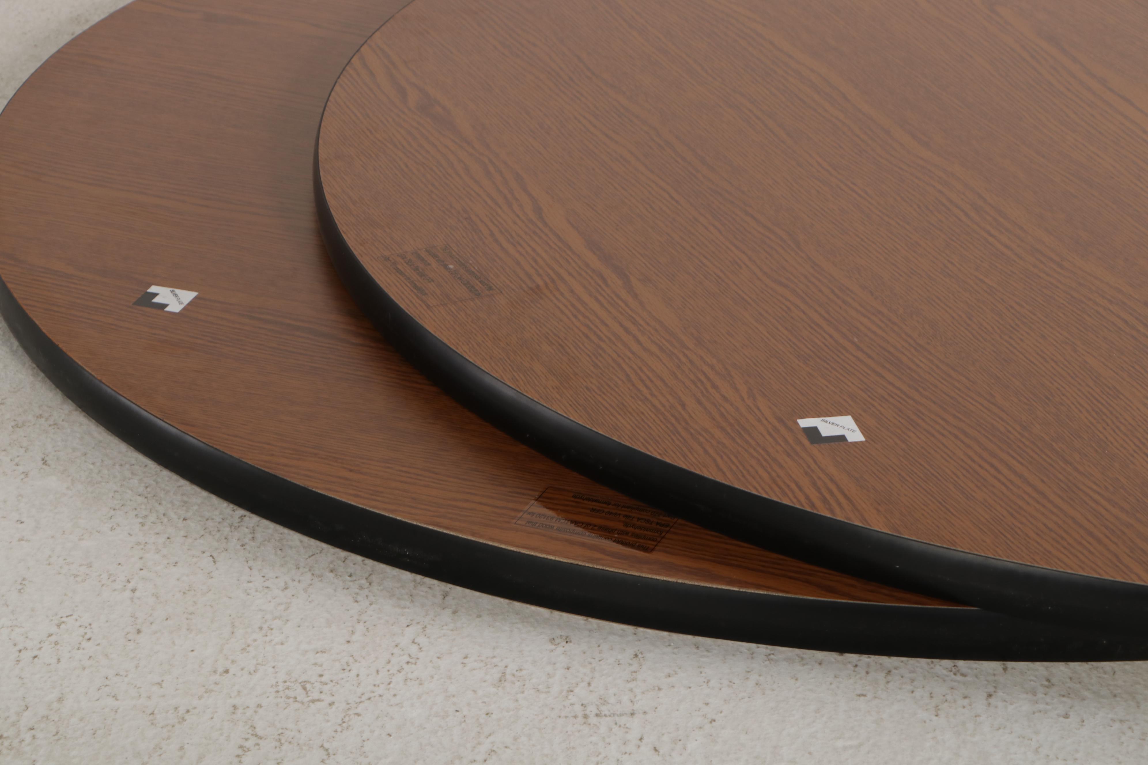 Two 4' Round Laminate Table Tops