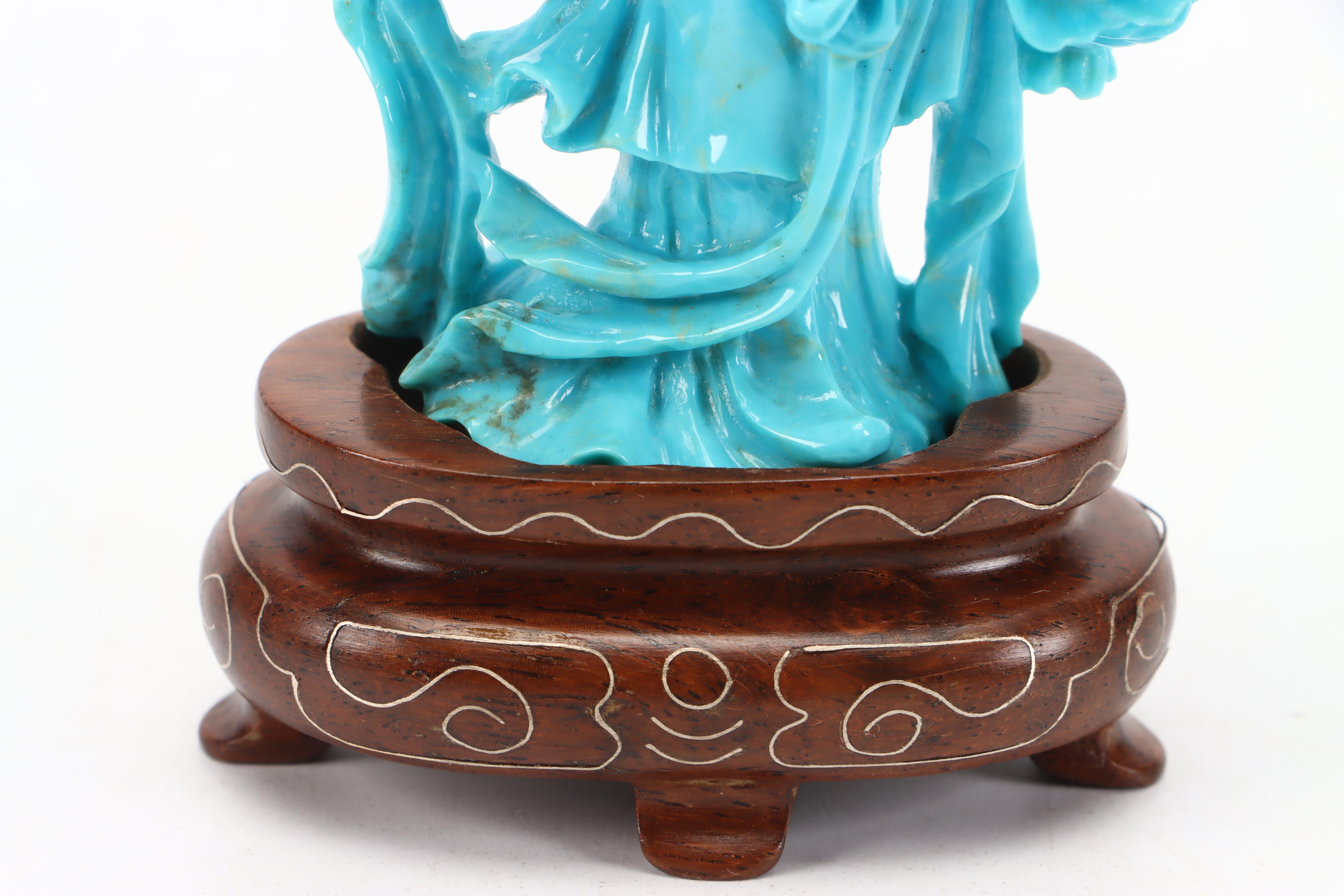 Chinese Turquoise Carving of Female Deity Surrounded by Flowers