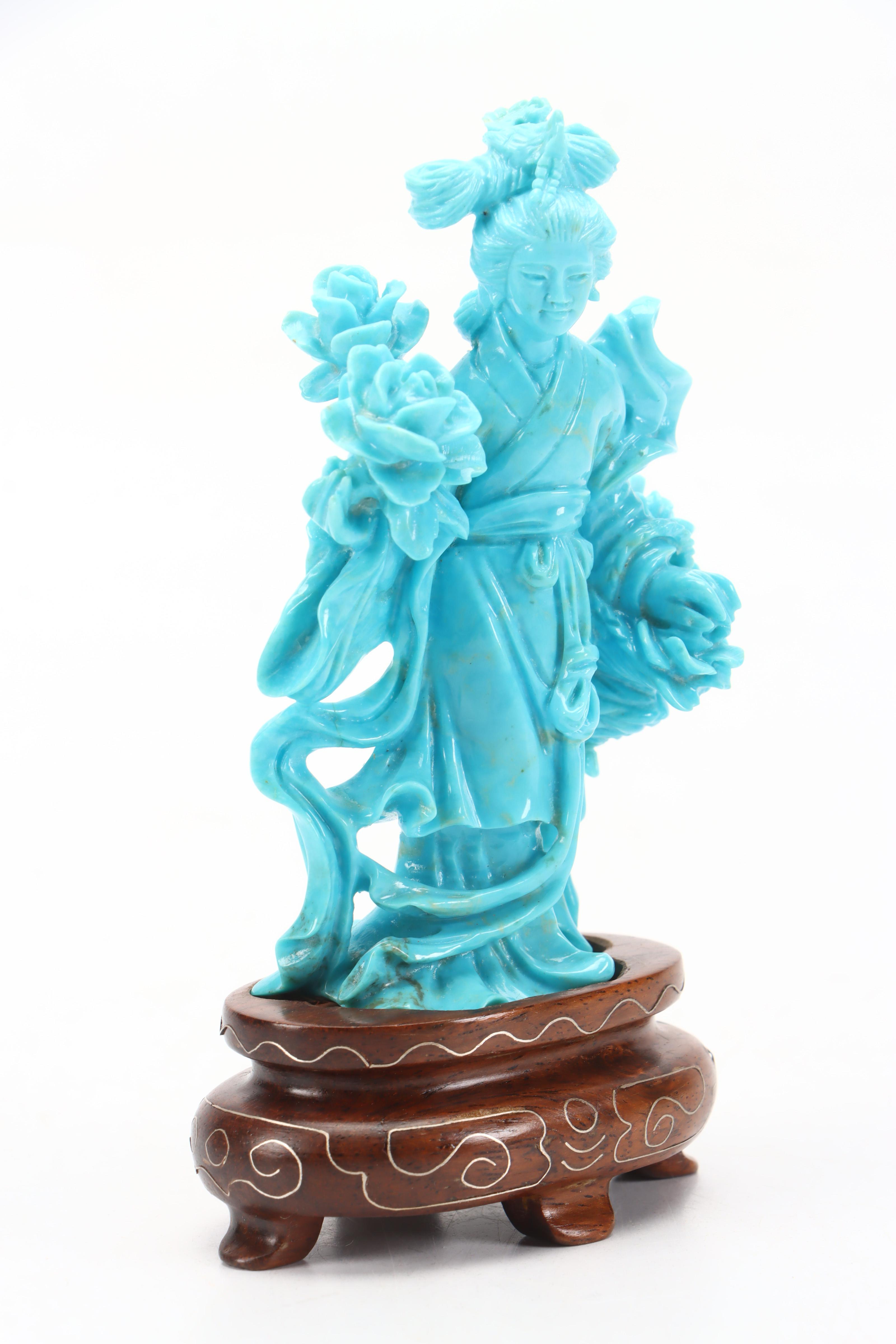 Chinese Turquoise Carving of Female Deity Surrounded by Flowers