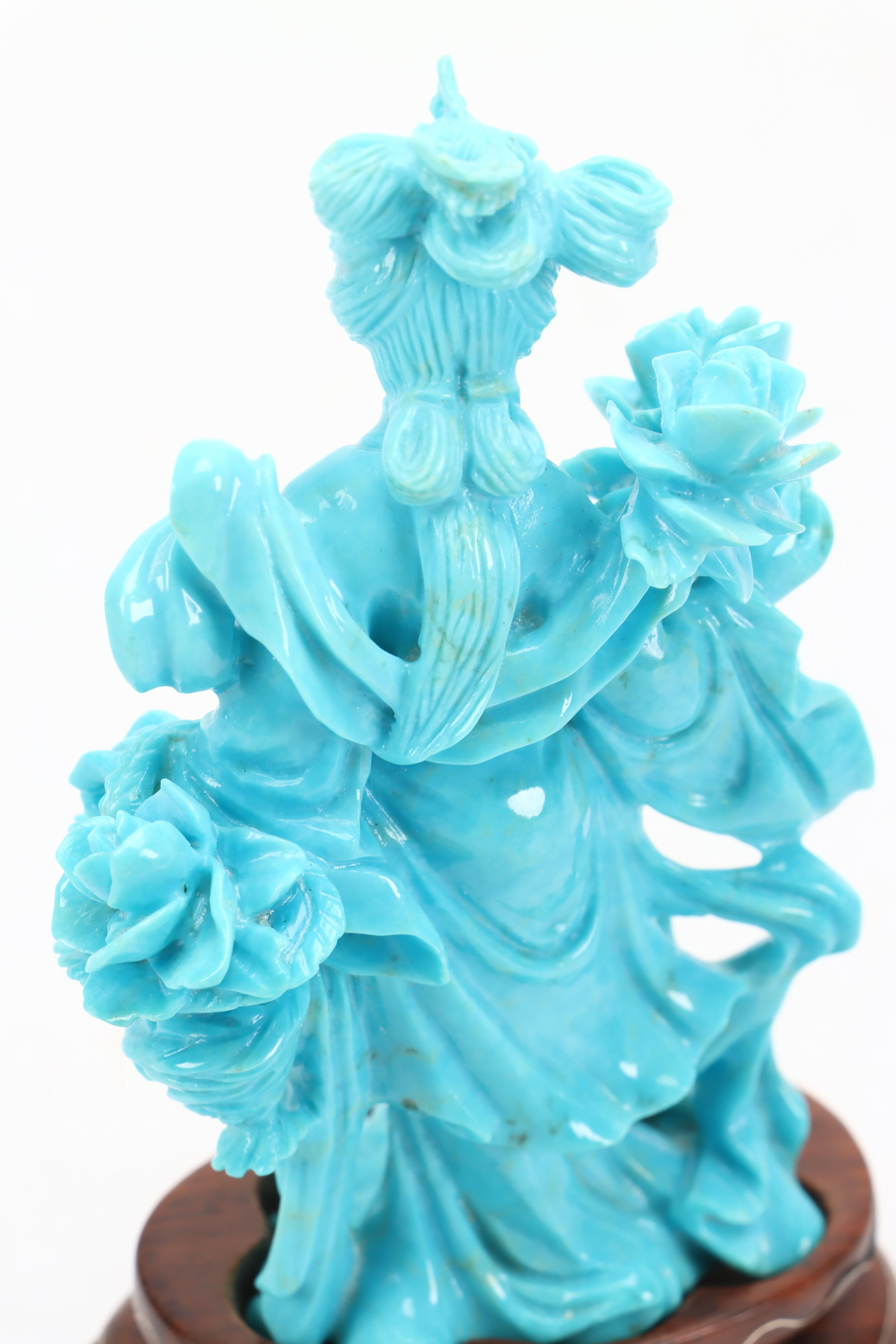 Chinese Turquoise Carving of Female Deity Surrounded by Flowers
