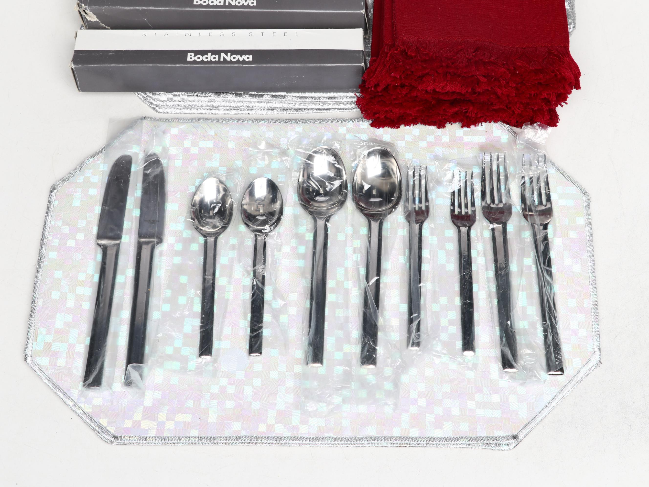 Boda Nova Stainless Steel Flatware with Jorge Santos Napkins and Other Placemats