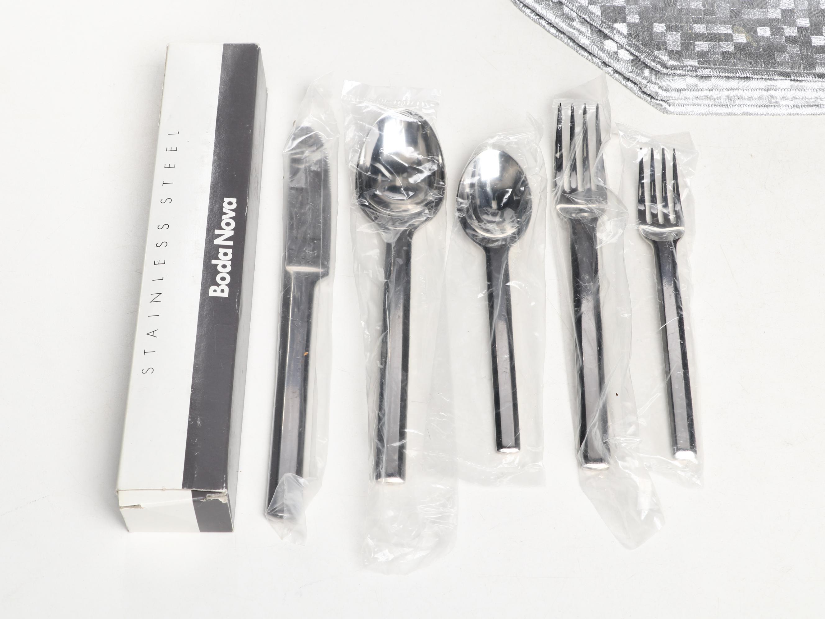 Boda Nova Stainless Steel Flatware with Jorge Santos Napkins and Other Placemats