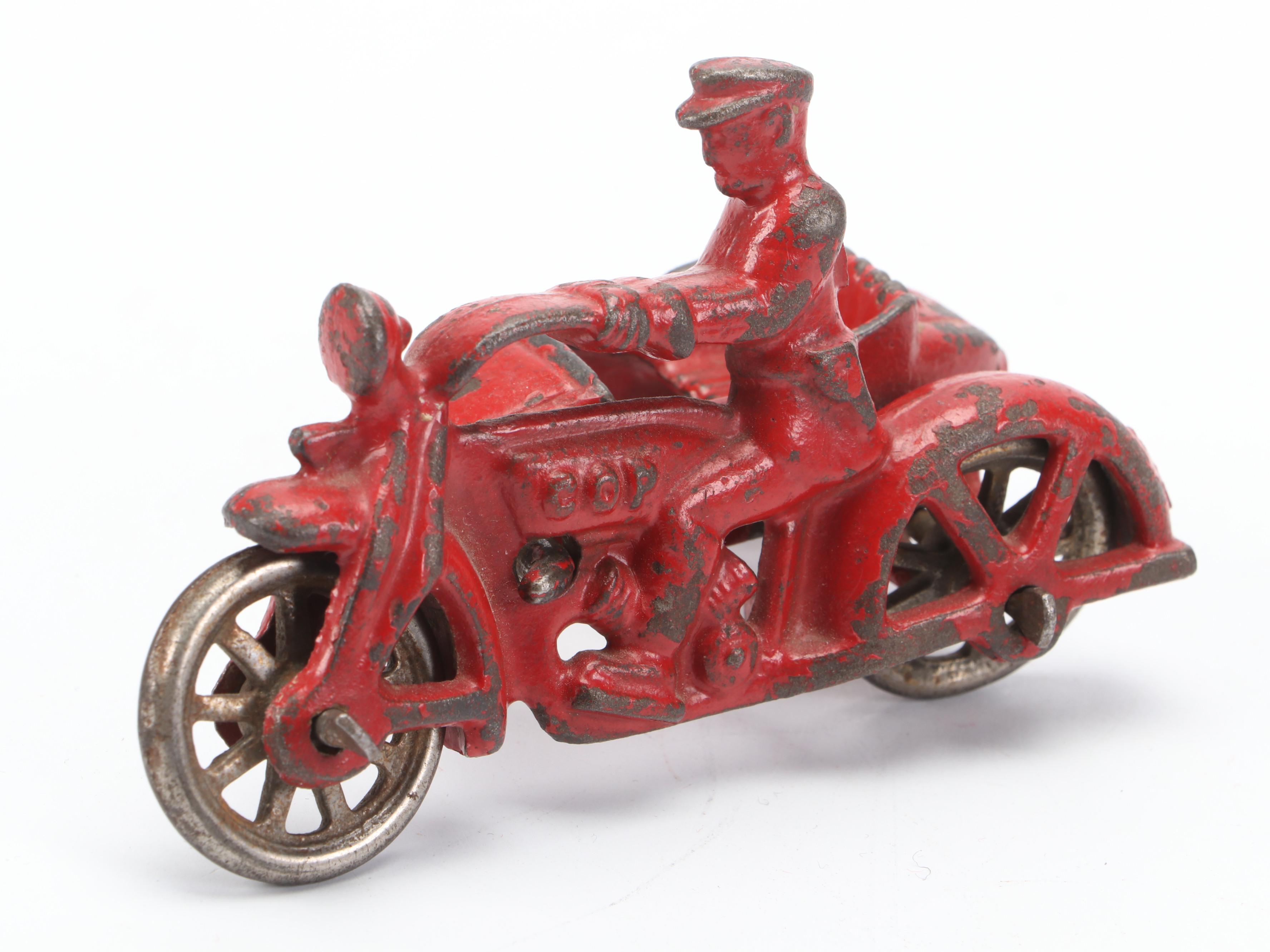 Hubley Cast Iron Cops Riding Champion and Other Motorcycles, Early 20th Century