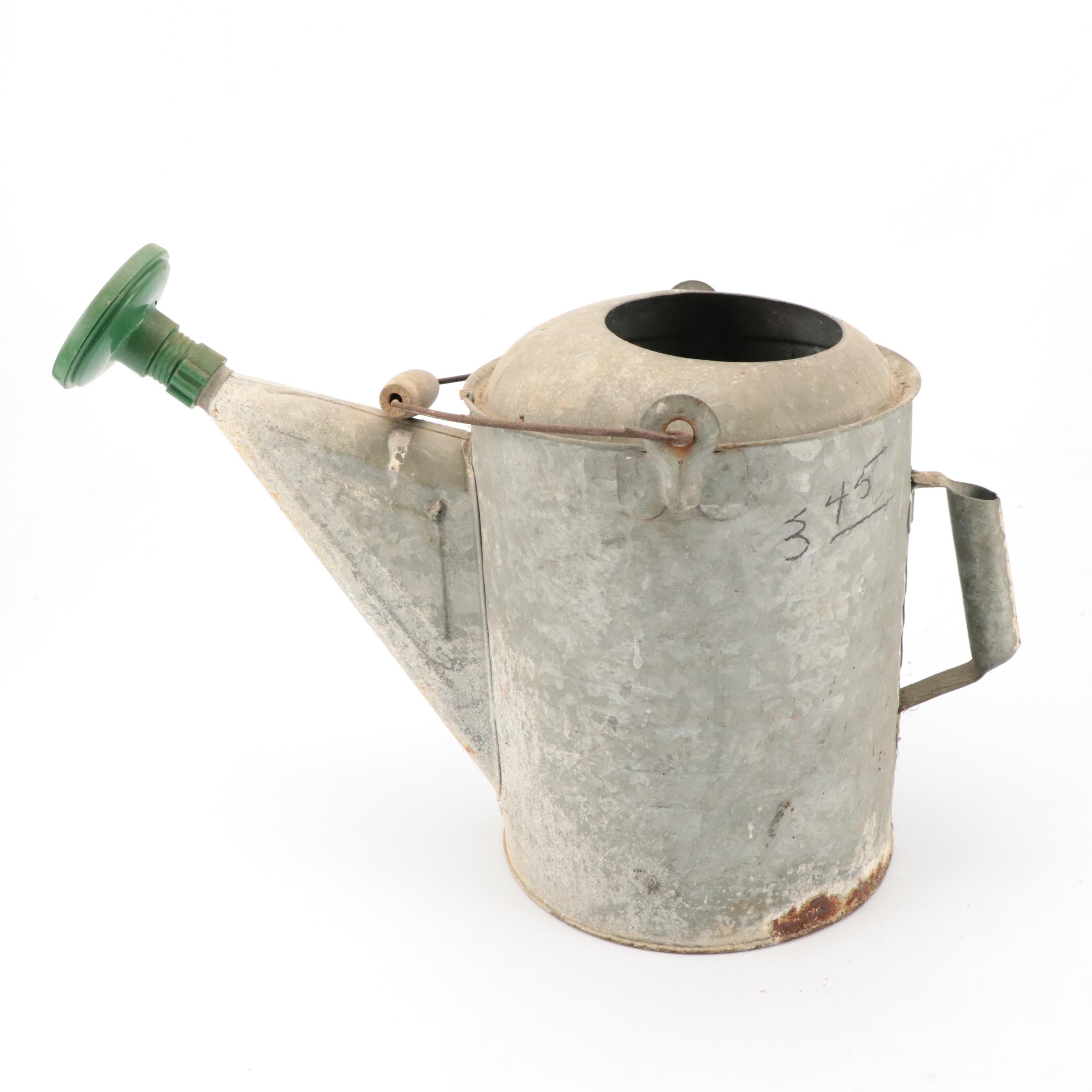 Metal Watering Can with Embosse Terracotta Planter and More