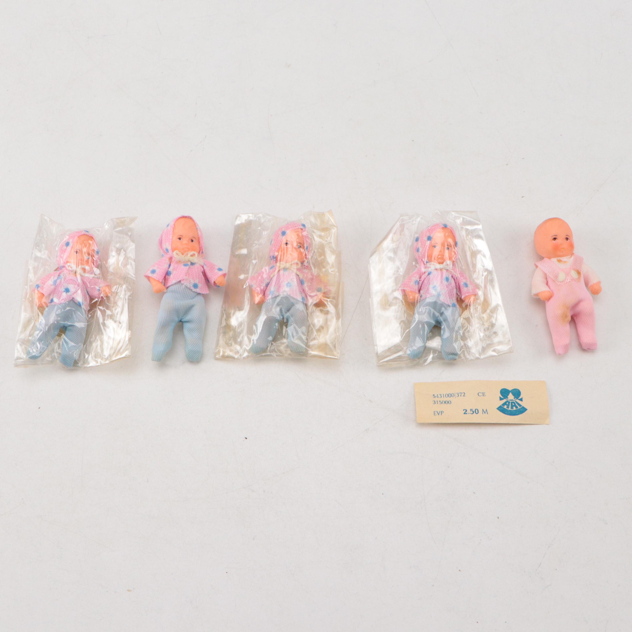 D.H. Fargo & Co. Leather Baby Boots, ARI Rubber Dolls, and Wooden Bobbins