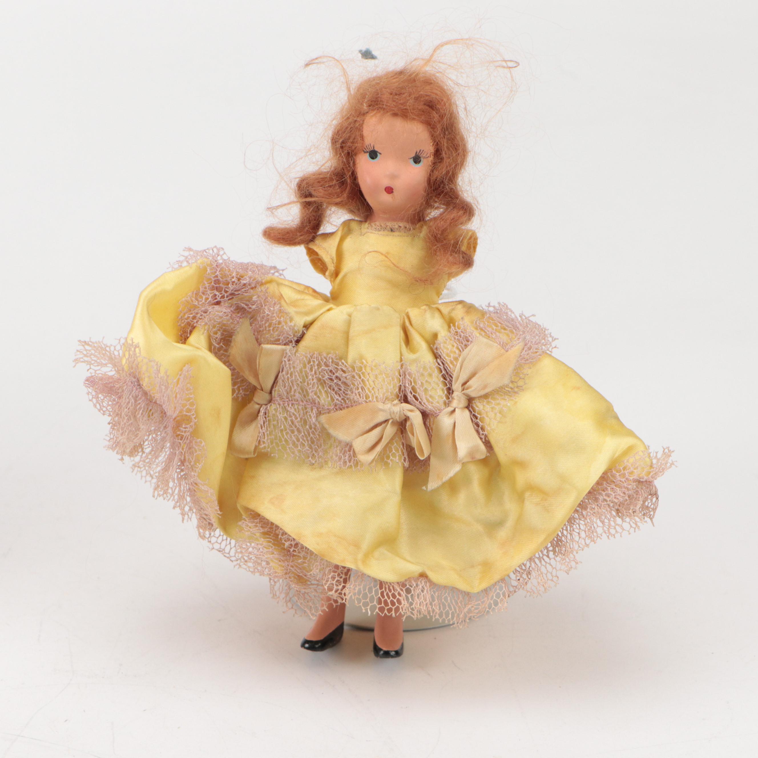 D.H. Fargo & Co. Leather Baby Boots, ARI Rubber Dolls, and Wooden Bobbins