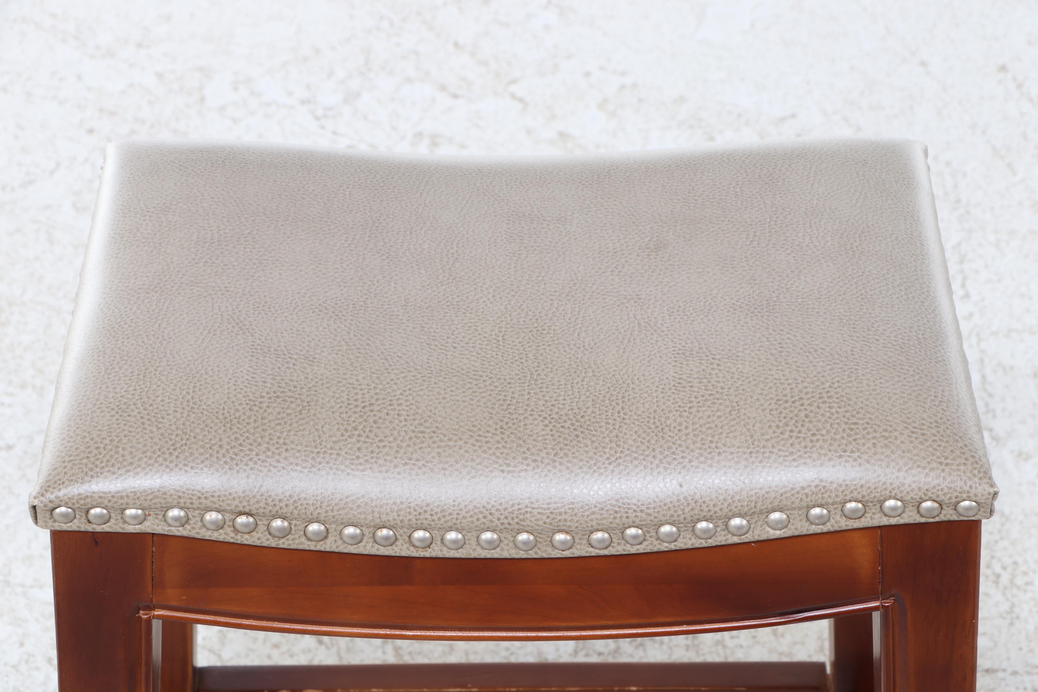 Four Contemporary Hardwood and Faux-Leather Counter Stools with Nailheads