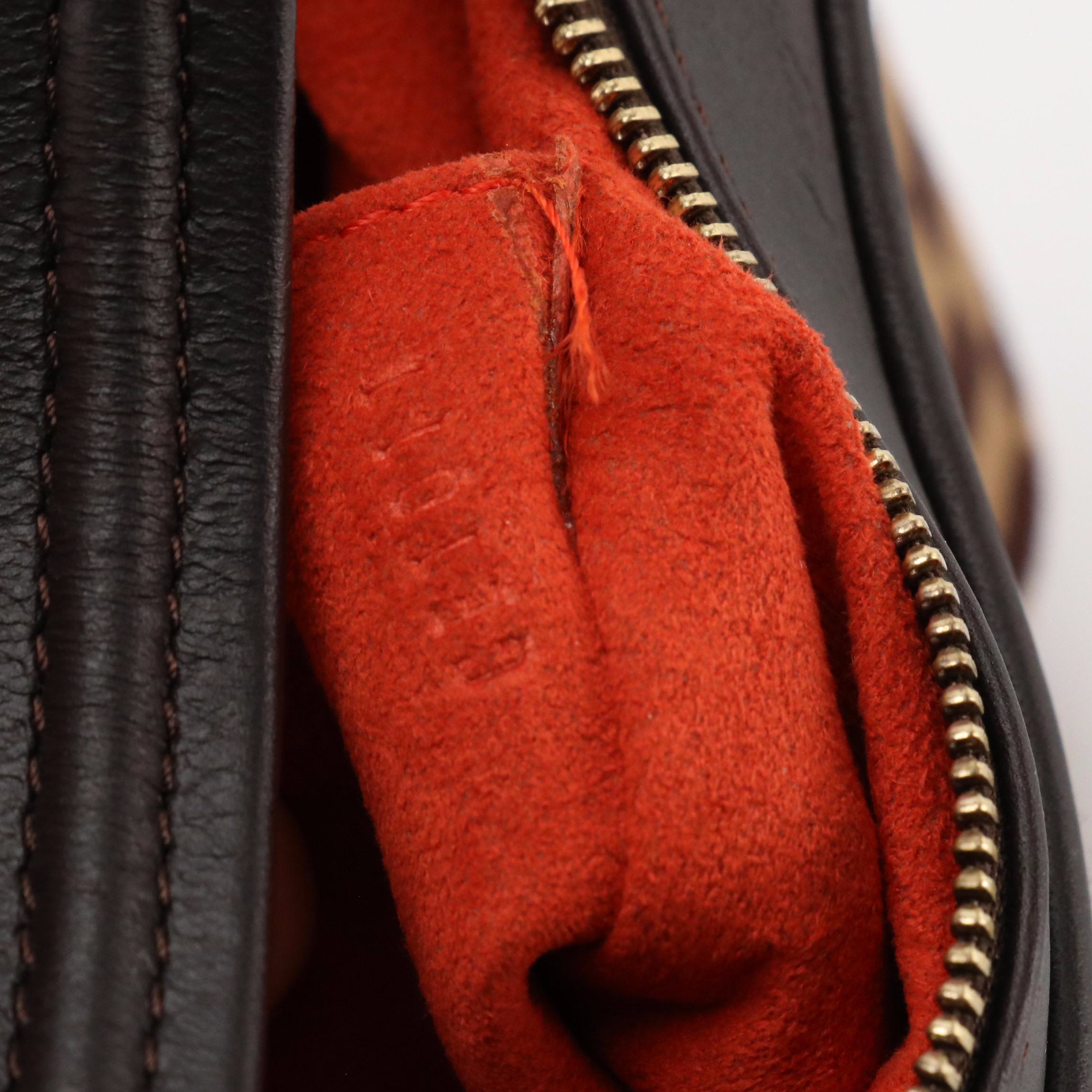 Louis Vuitton Limited Edition Tigre Bag in Damier Sauvage Calf Hair and Leather