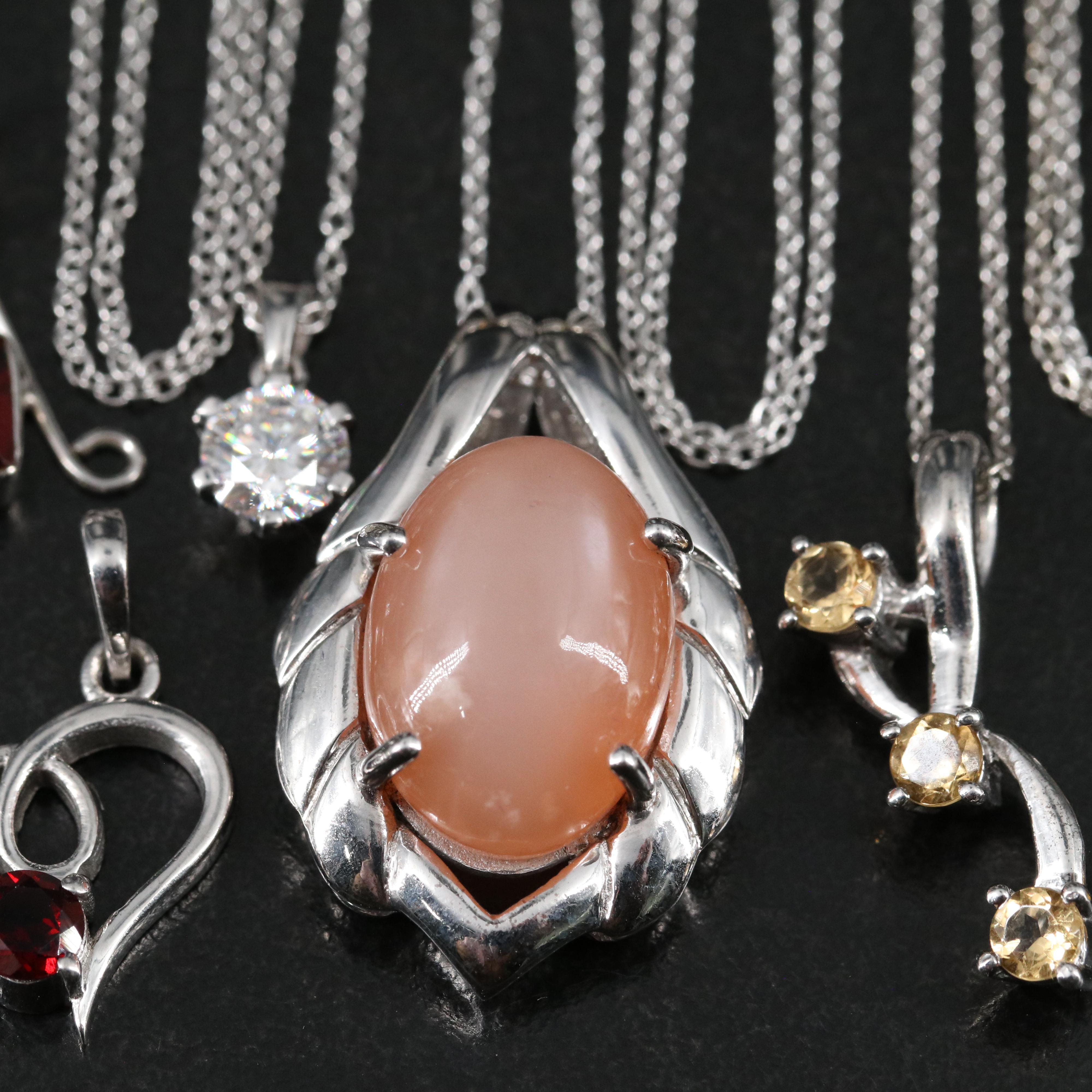 14 Assorted Sterling Silver Rings, Necklaces, Earrings, and Pendants