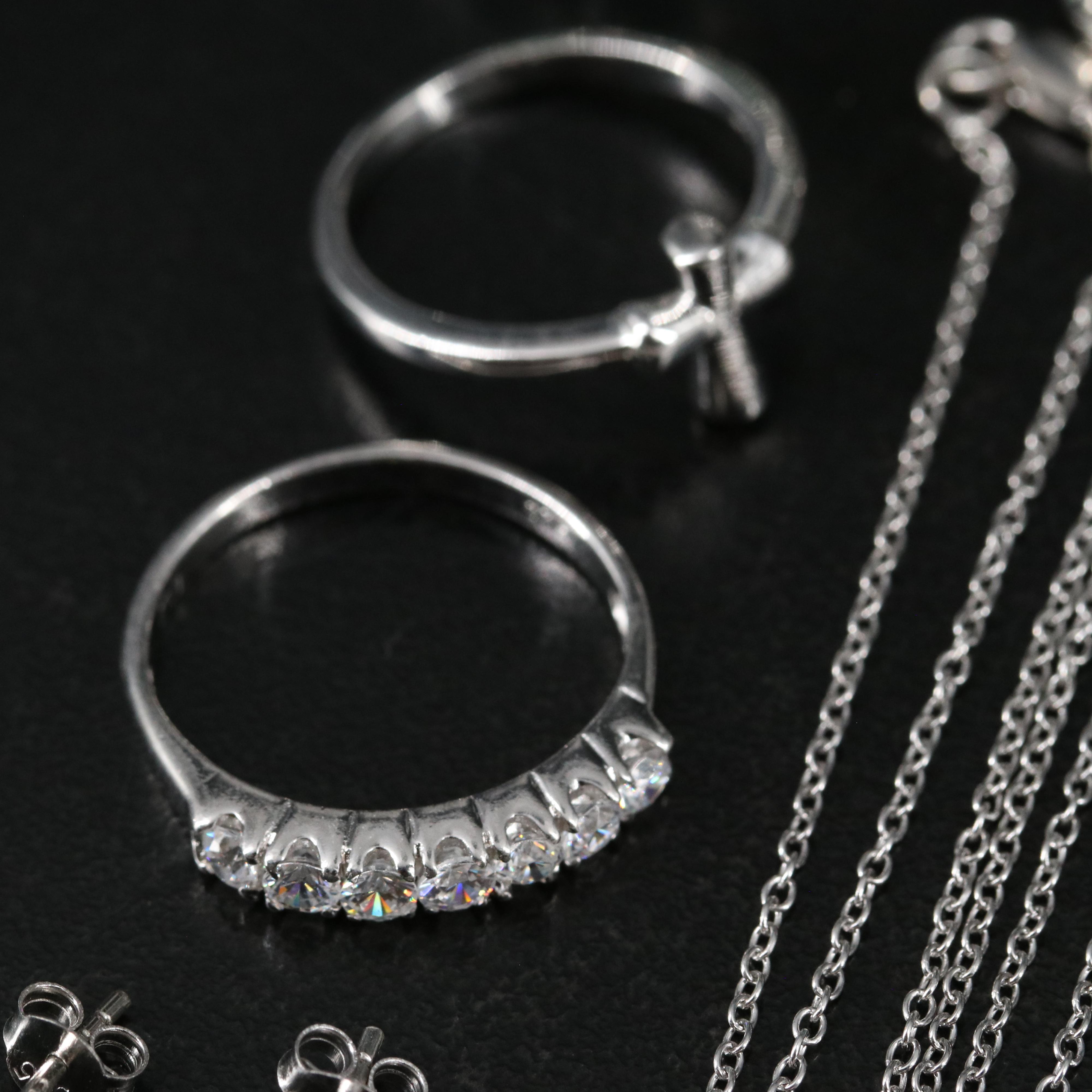 14 Assorted Sterling Silver Rings, Necklaces, Earrings, and Pendants