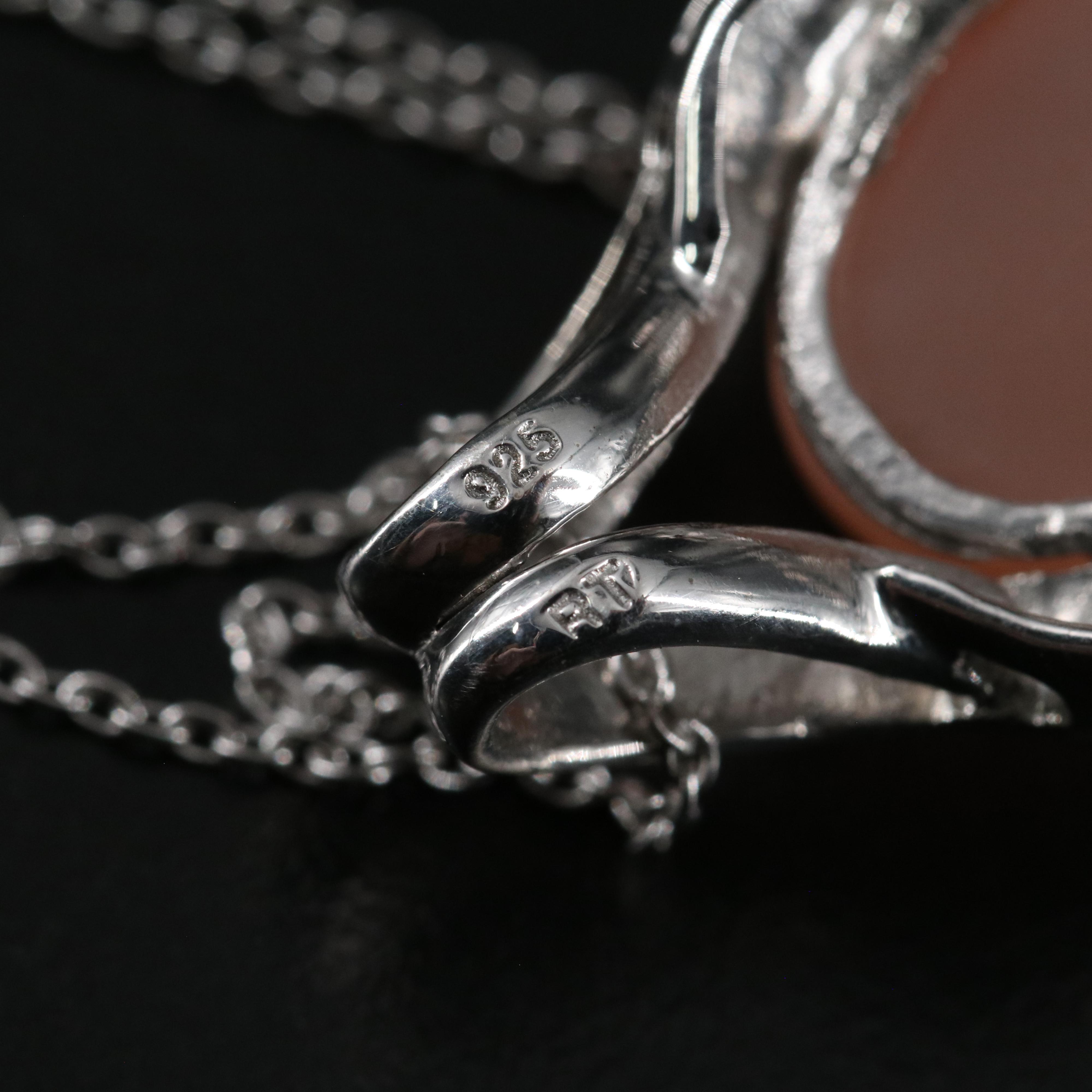 14 Assorted Sterling Silver Rings, Necklaces, Earrings, and Pendants