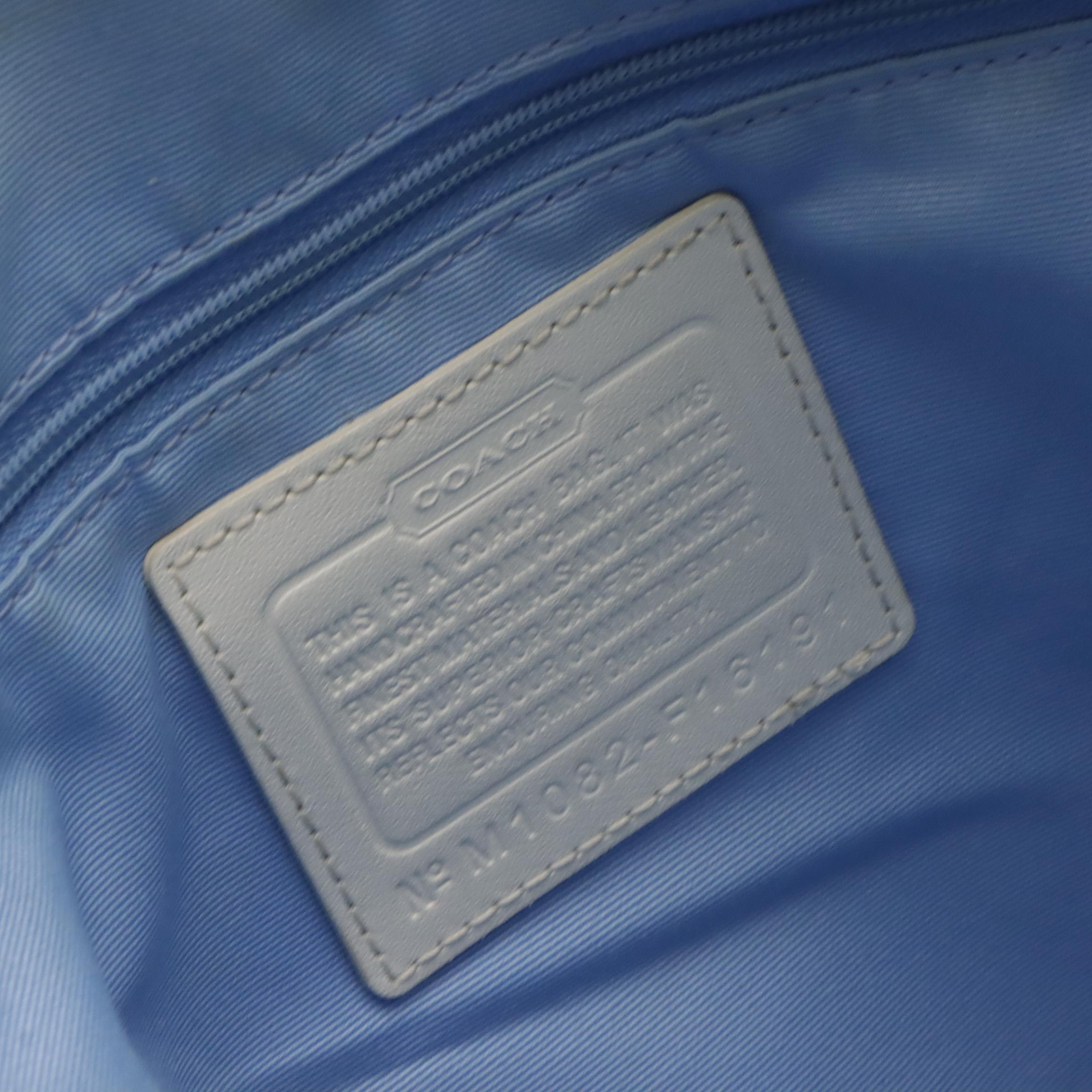 Coach Heritage Stripe Chelsea Hobo, Kipling Skyler Tote, and Vieta 2-Way Bag