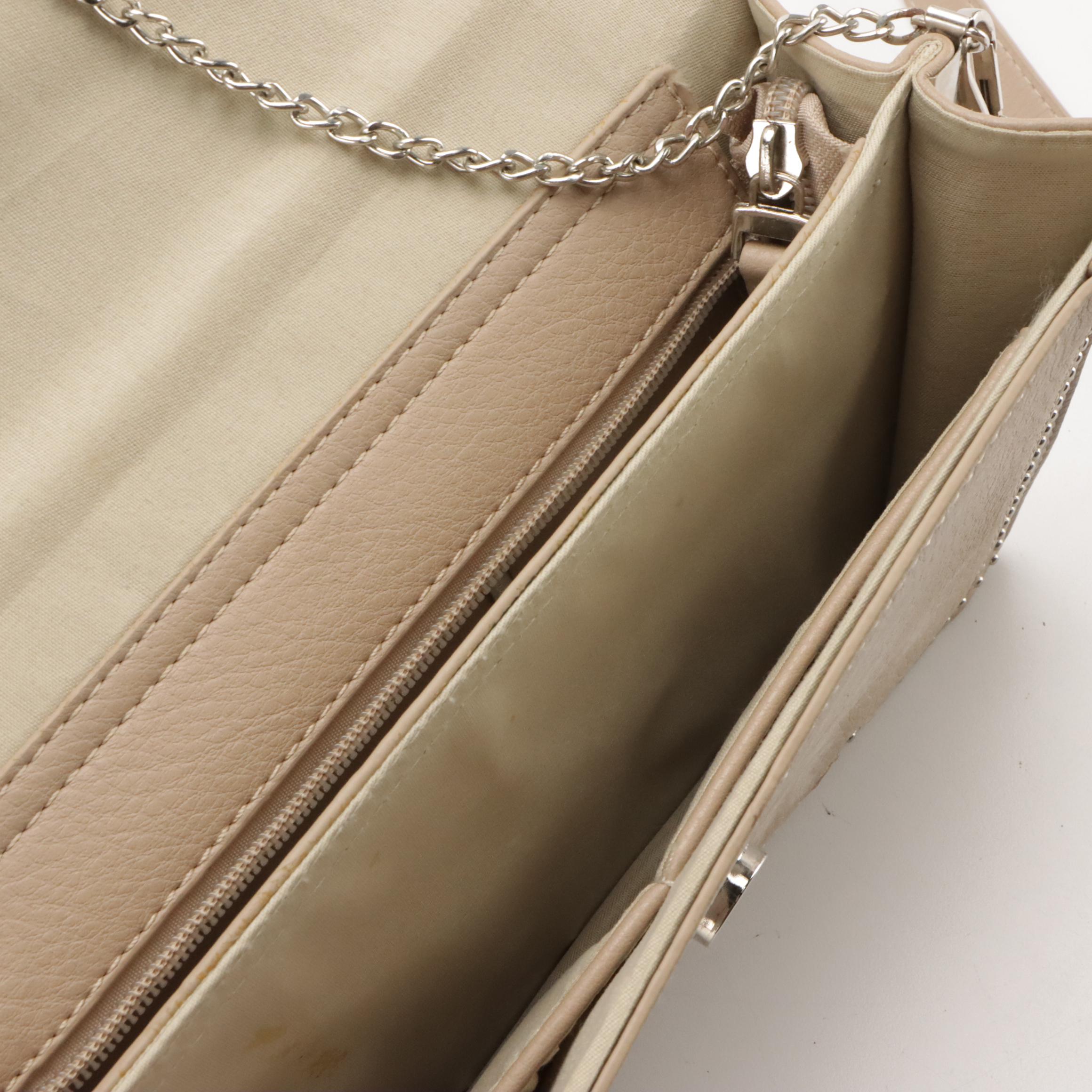 Coach Heritage Stripe Chelsea Hobo, Kipling Skyler Tote, and Vieta 2-Way Bag