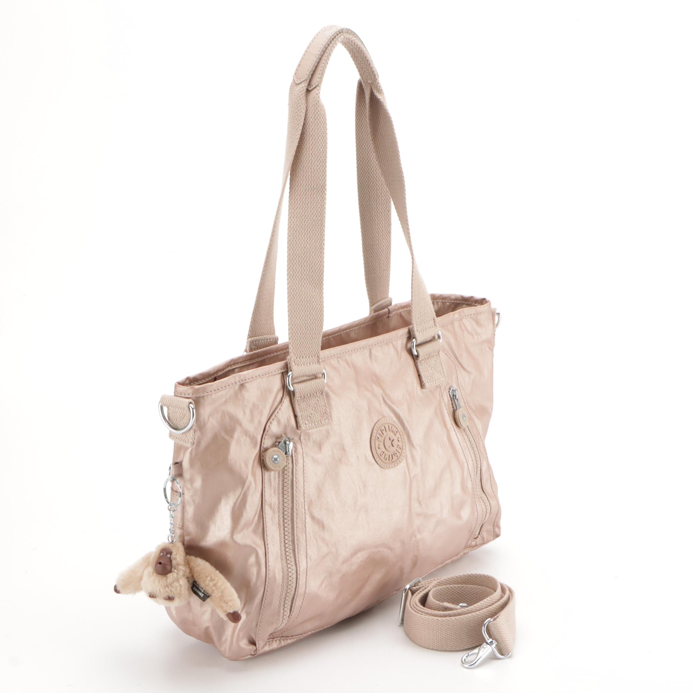 Coach Heritage Stripe Chelsea Hobo, Kipling Skyler Tote, and Vieta 2-Way Bag