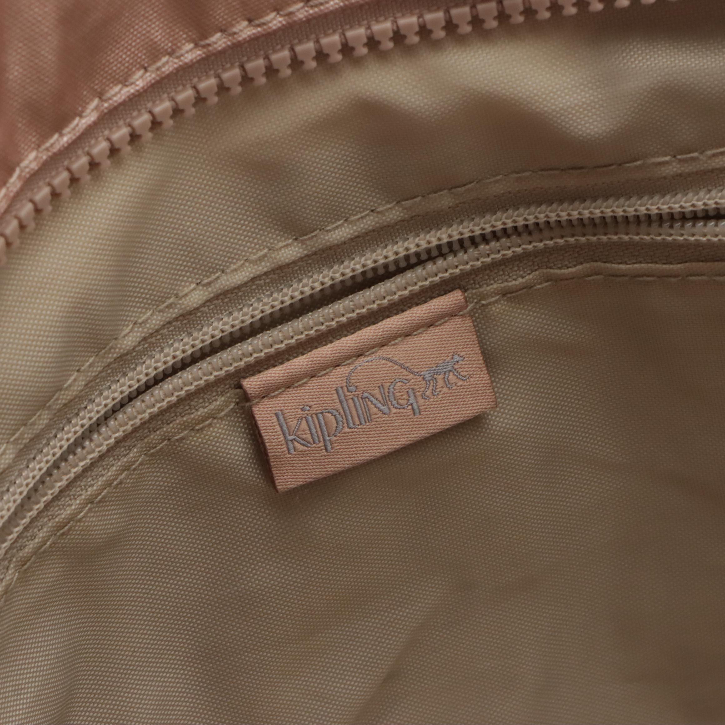 Coach Heritage Stripe Chelsea Hobo, Kipling Skyler Tote, and Vieta 2-Way Bag