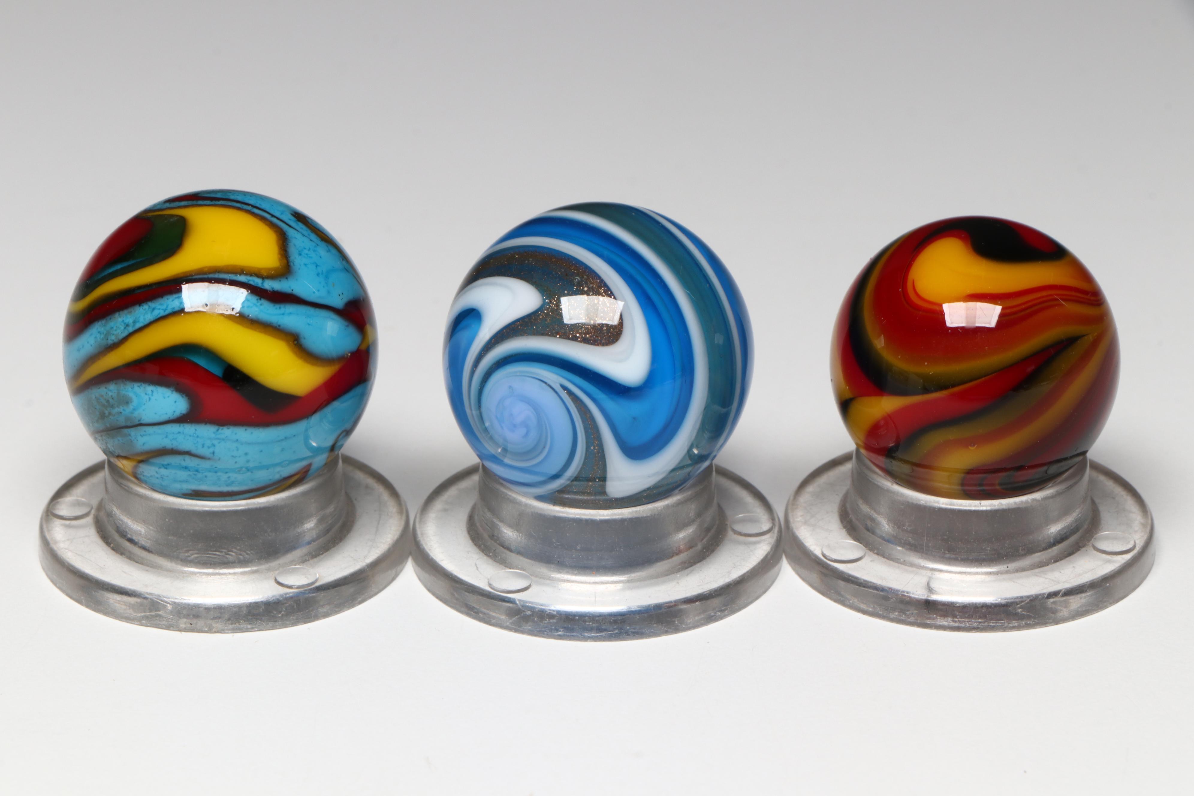 Scott Patrick Golden Rebel, Superman and Rebel with Other Art Glass Marbles