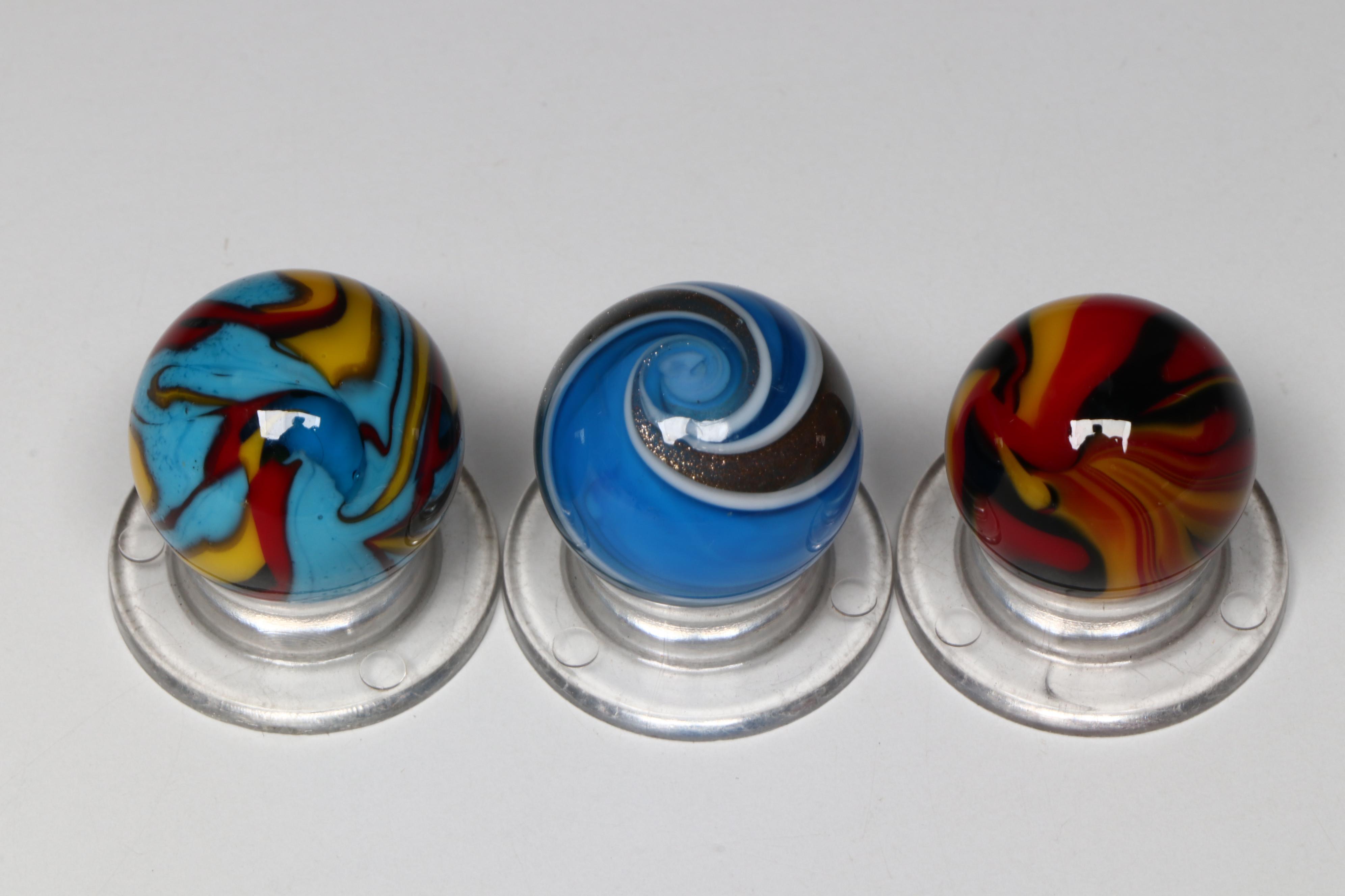 Scott Patrick Golden Rebel, Superman and Rebel with Other Art Glass Marbles