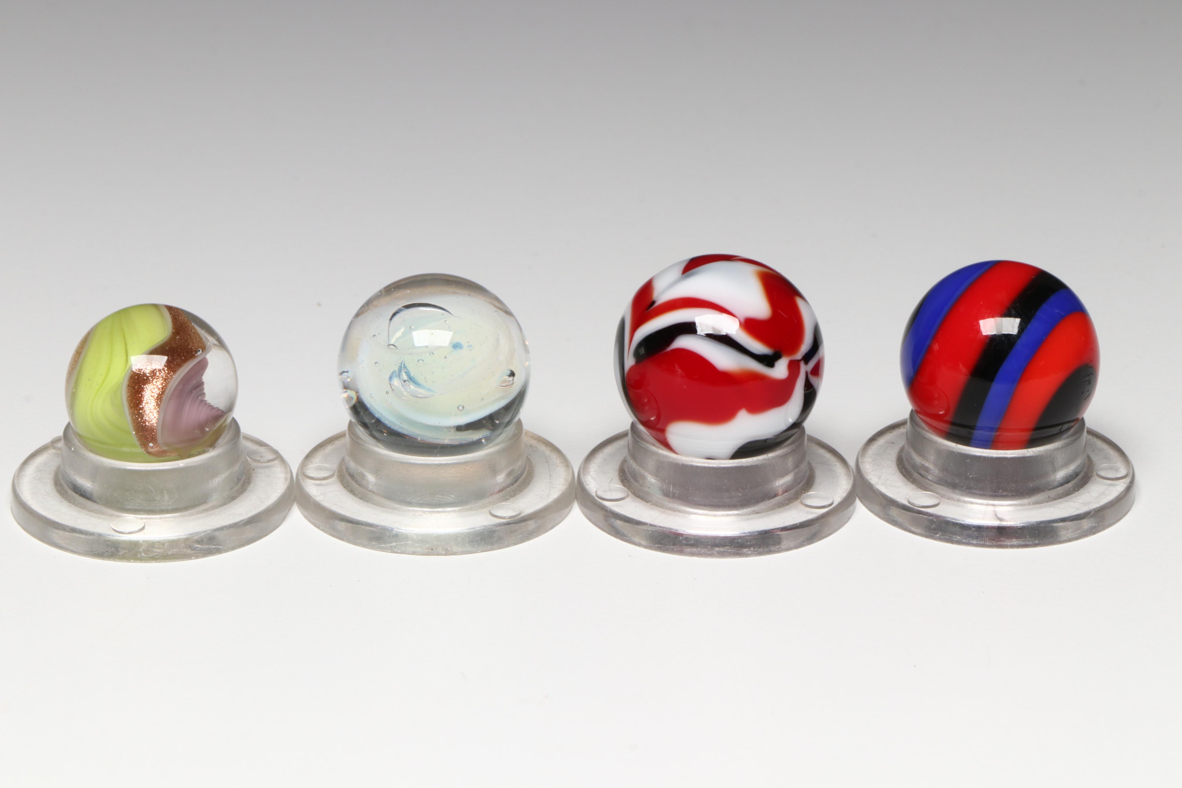 Scott Patrick Golden Rebel, Superman and Rebel with Other Art Glass Marbles