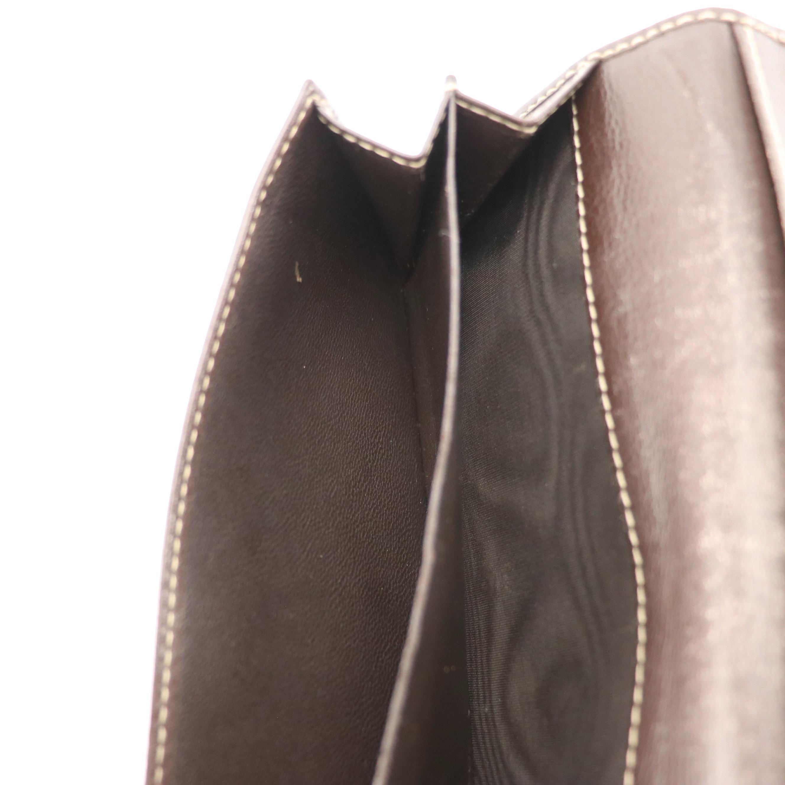 Gucci Heart-Flap Continental Wallet in GG Crystal Canvas and Brown Leather