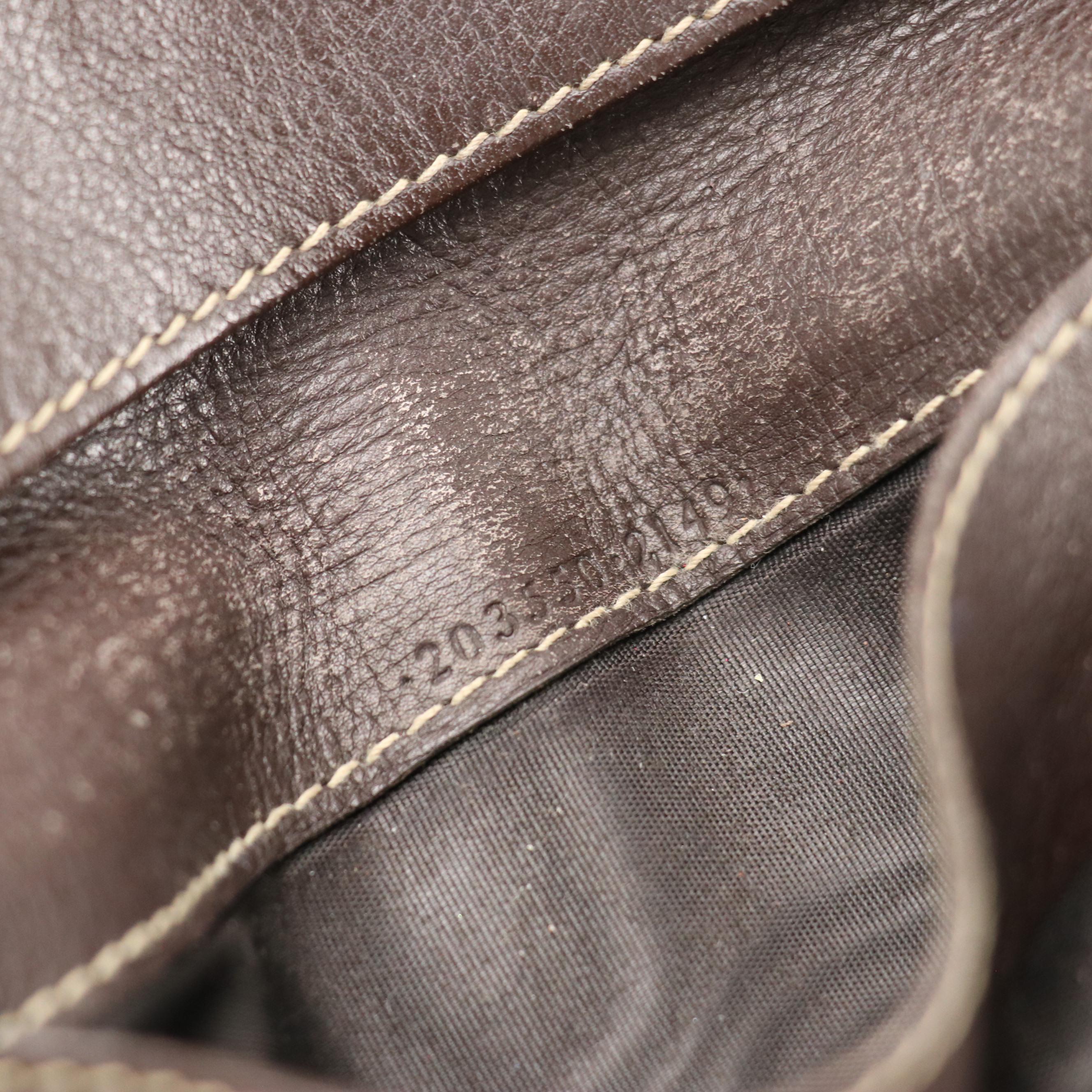 Gucci Heart-Flap Continental Wallet in GG Crystal Canvas and Brown Leather