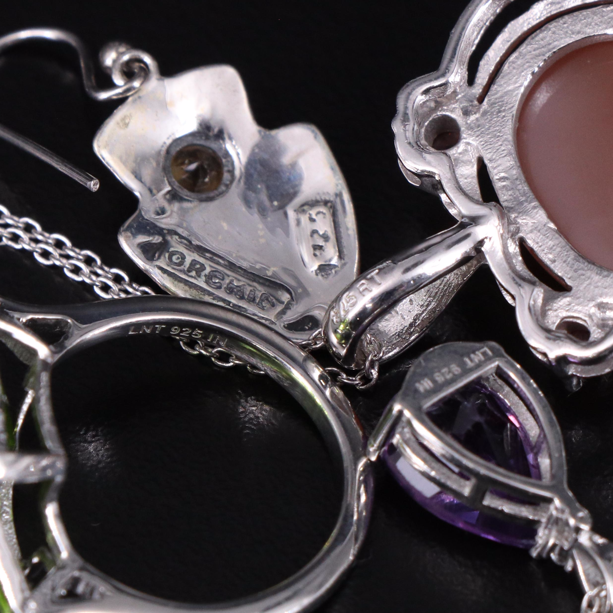 14 Assorted Sterling Silver Rings, Necklaces, Earrings, and Pendants
