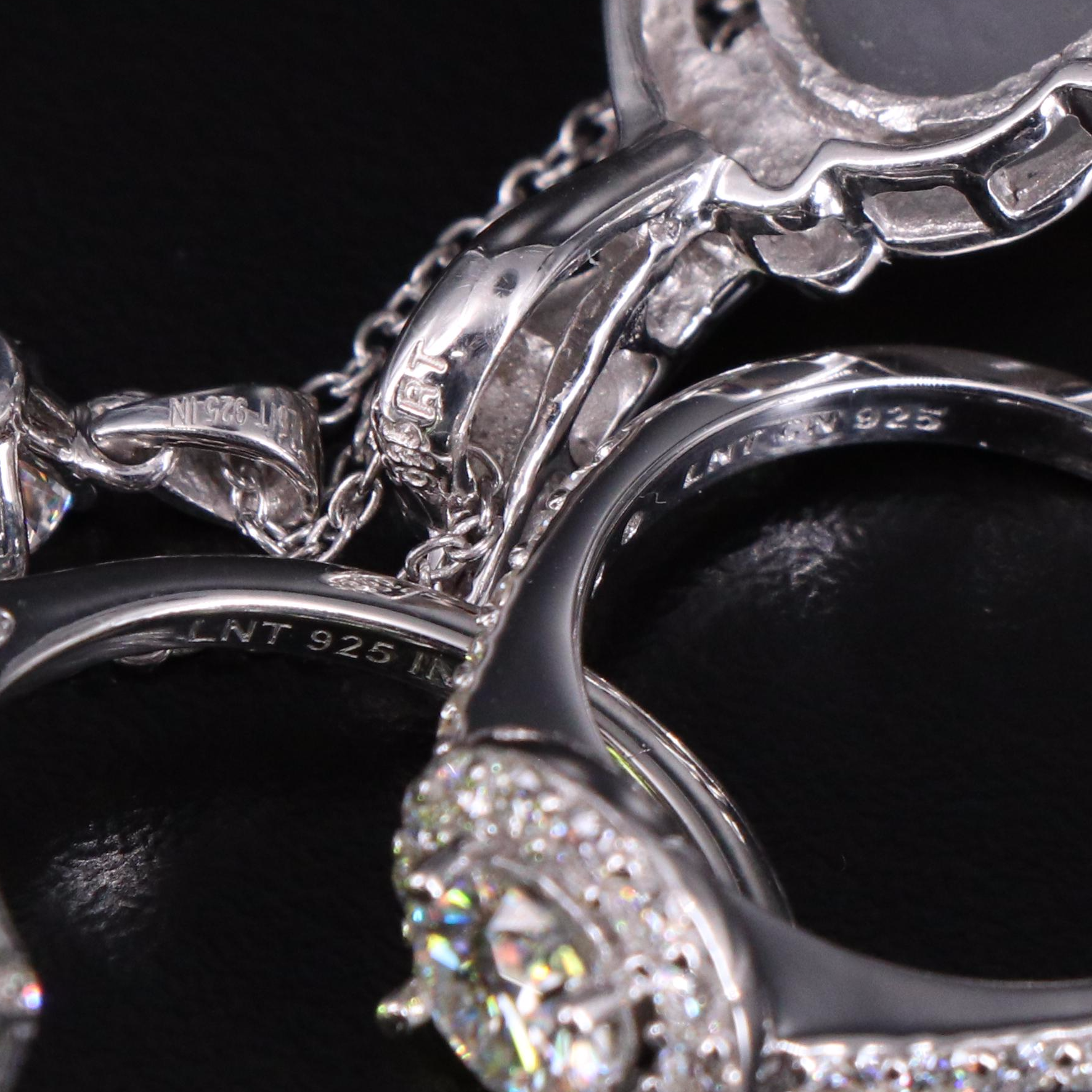 14 Assorted Sterling Silver Rings, Necklaces, Earrings, and Pendants