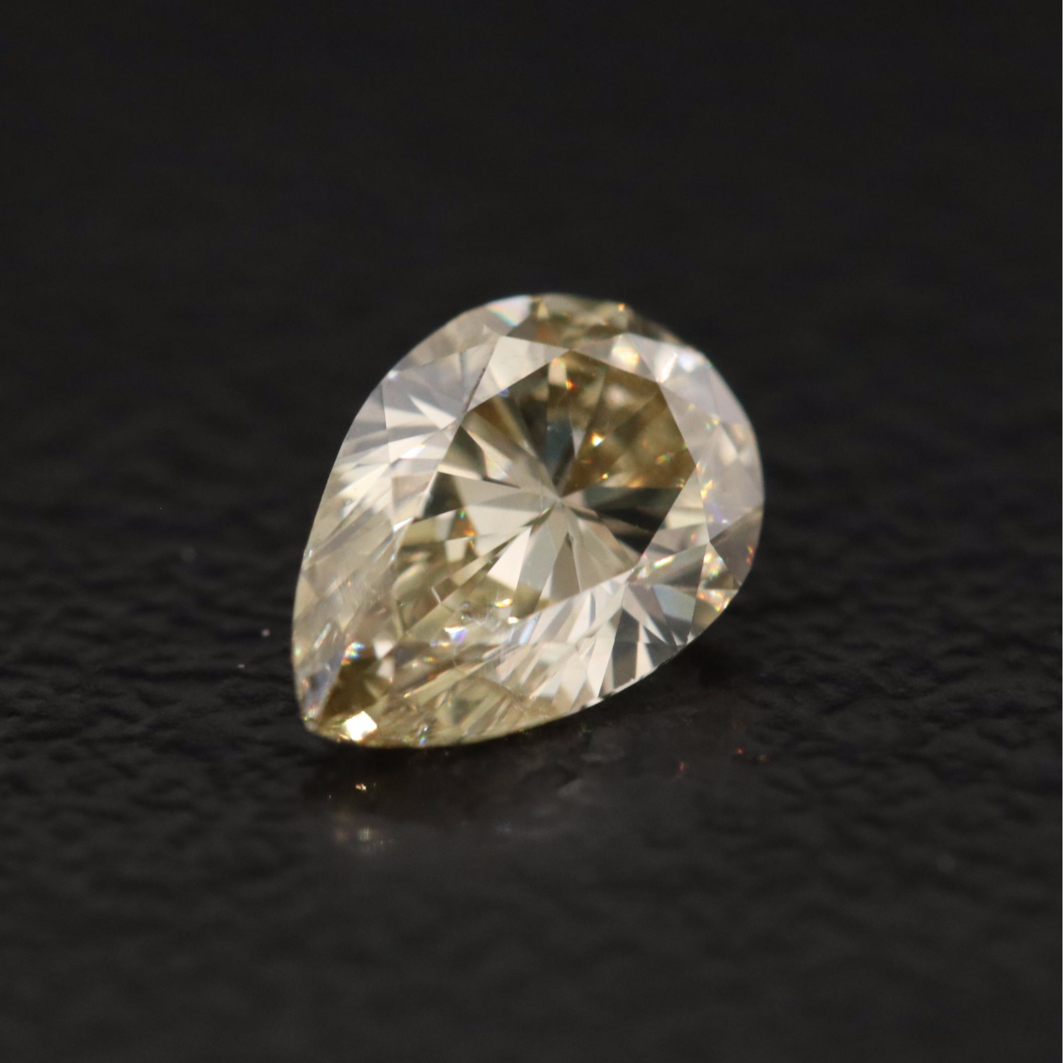Loose 0.52 CT Fancy Yellow Diamond