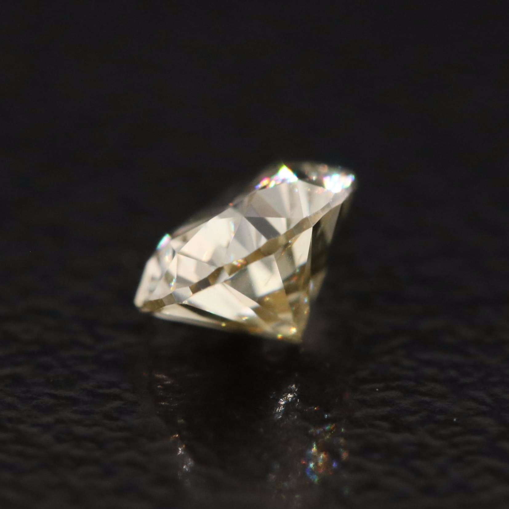 Loose 0.52 CT Fancy Yellow Diamond