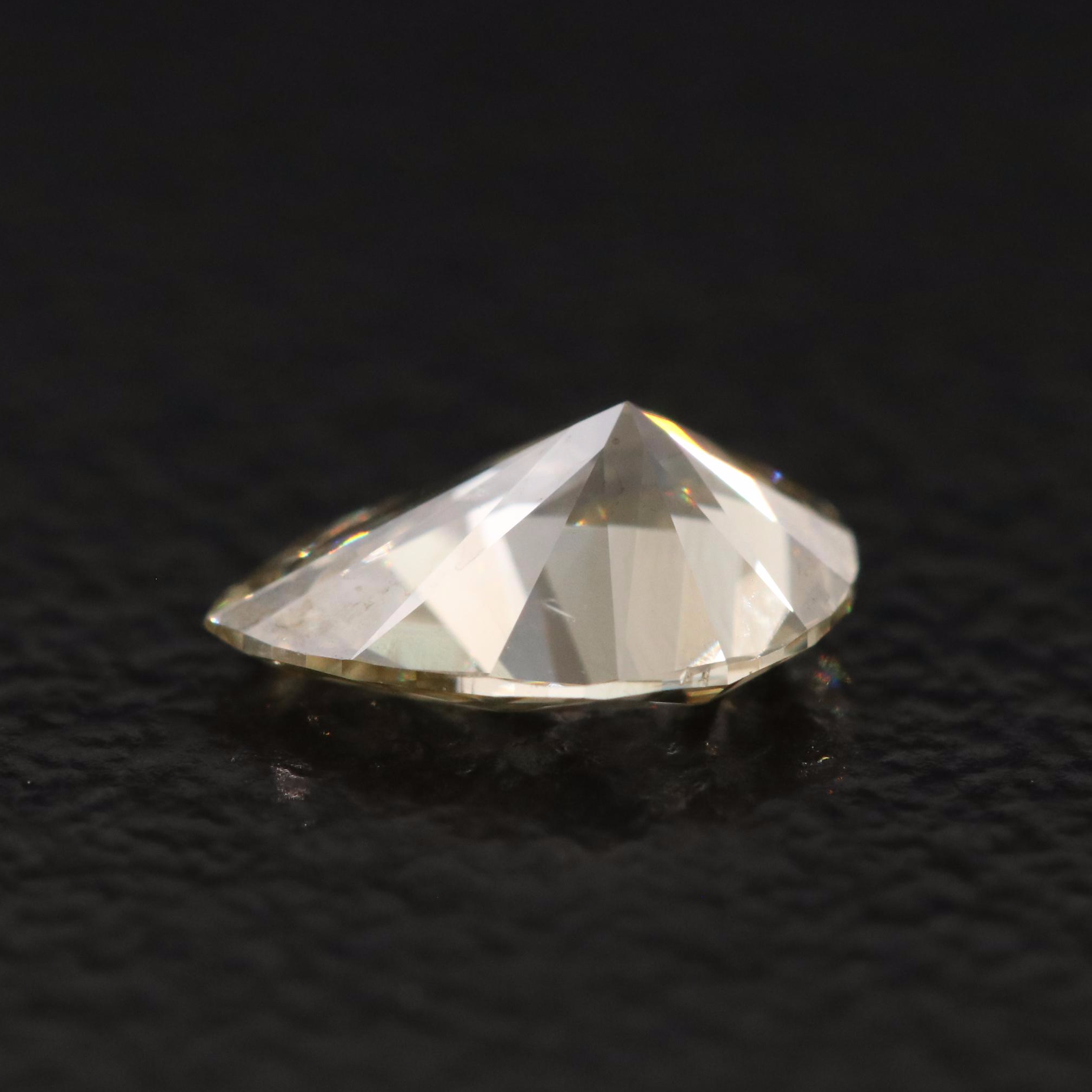 Loose 0.52 CT Fancy Yellow Diamond