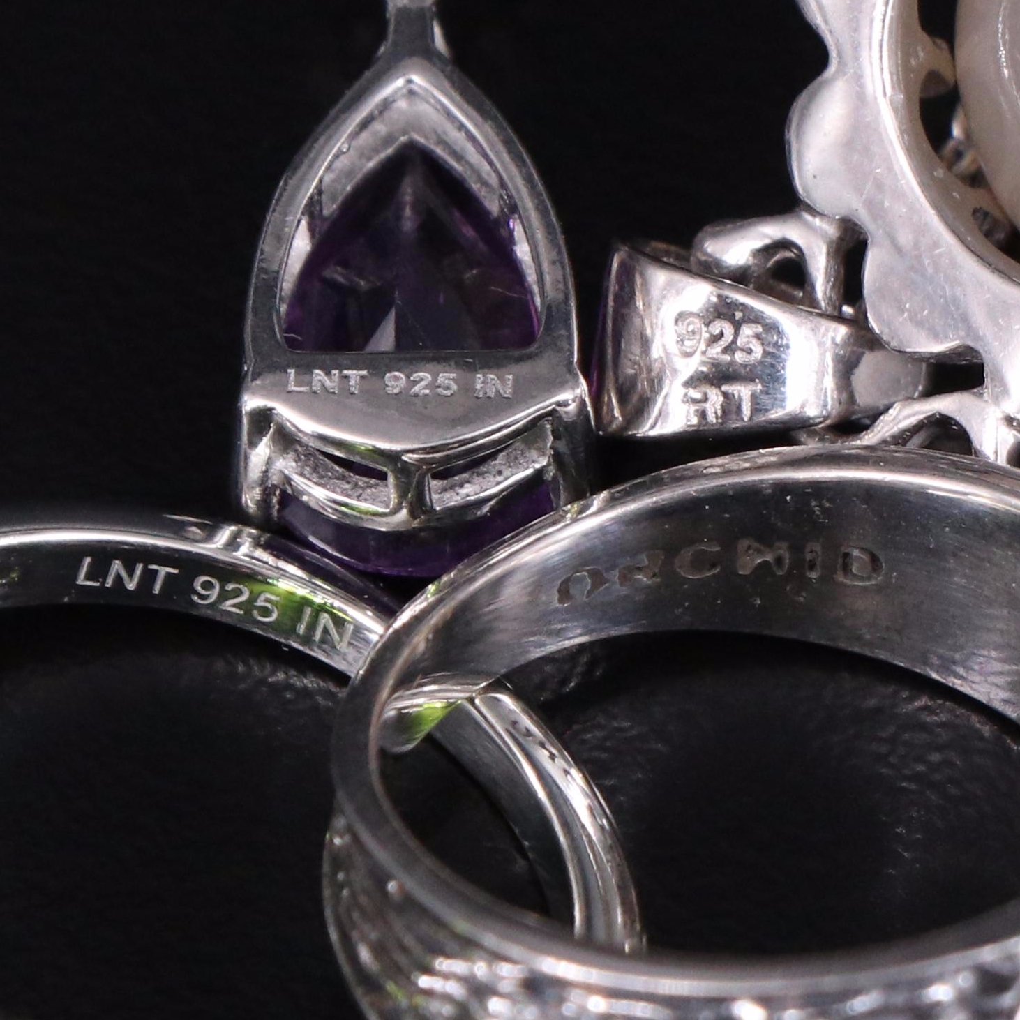 14 Assorted Sterling Silver Rings, Necklaces, Earrings, and Pendants