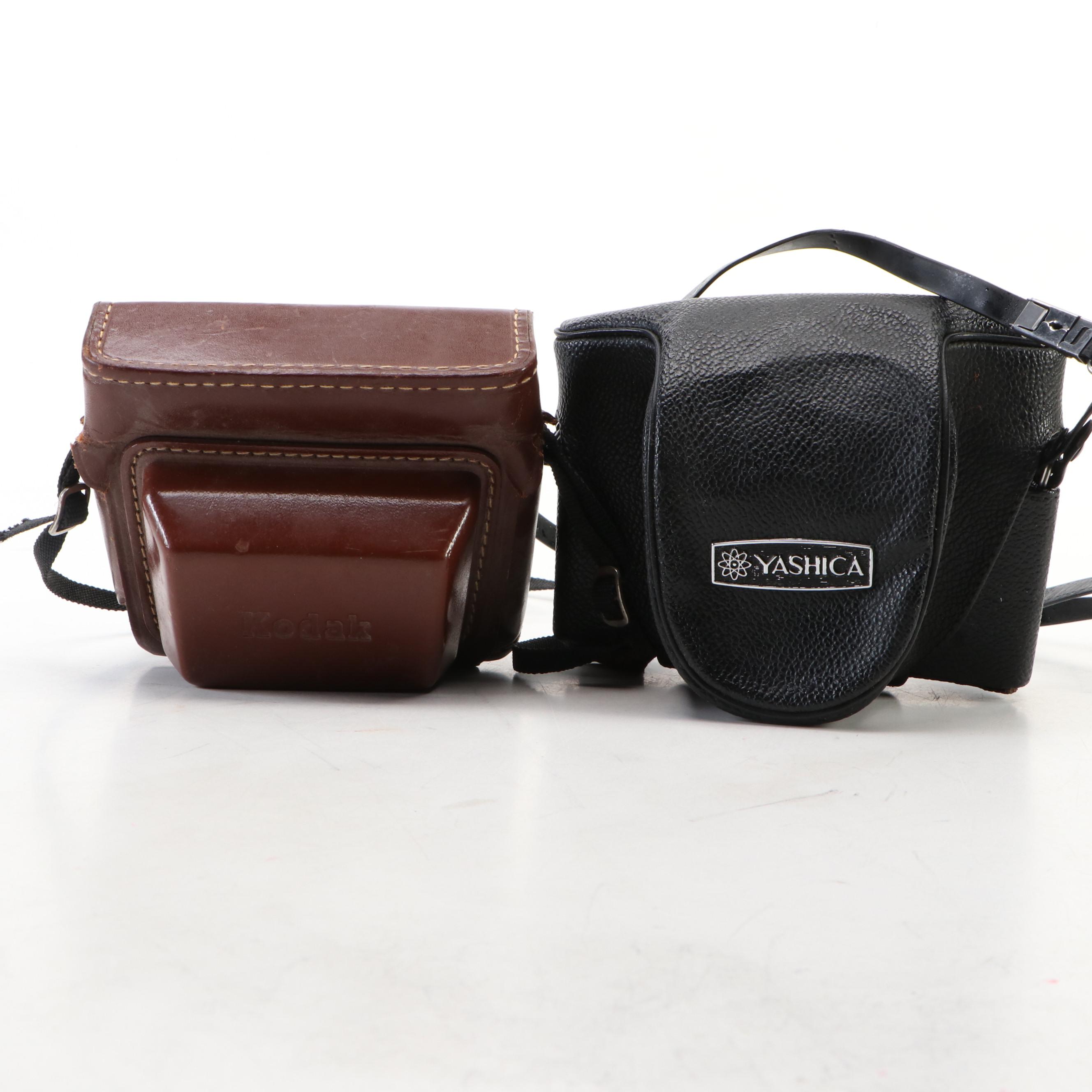Kodak Motormatic 35F and Yashica Electro 35 with Leather Cases