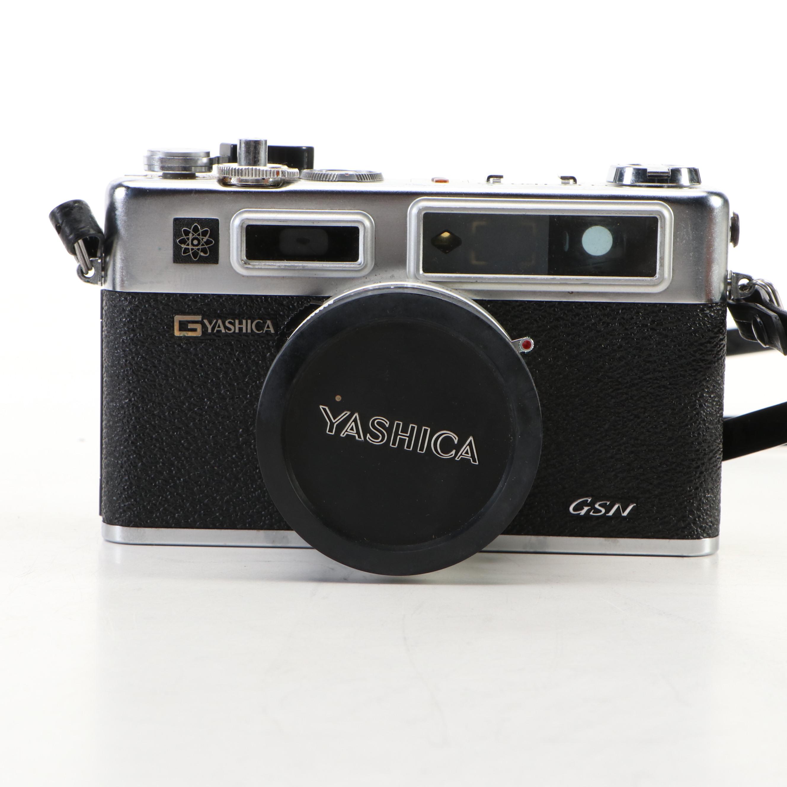 Kodak Motormatic 35F and Yashica Electro 35 with Leather Cases