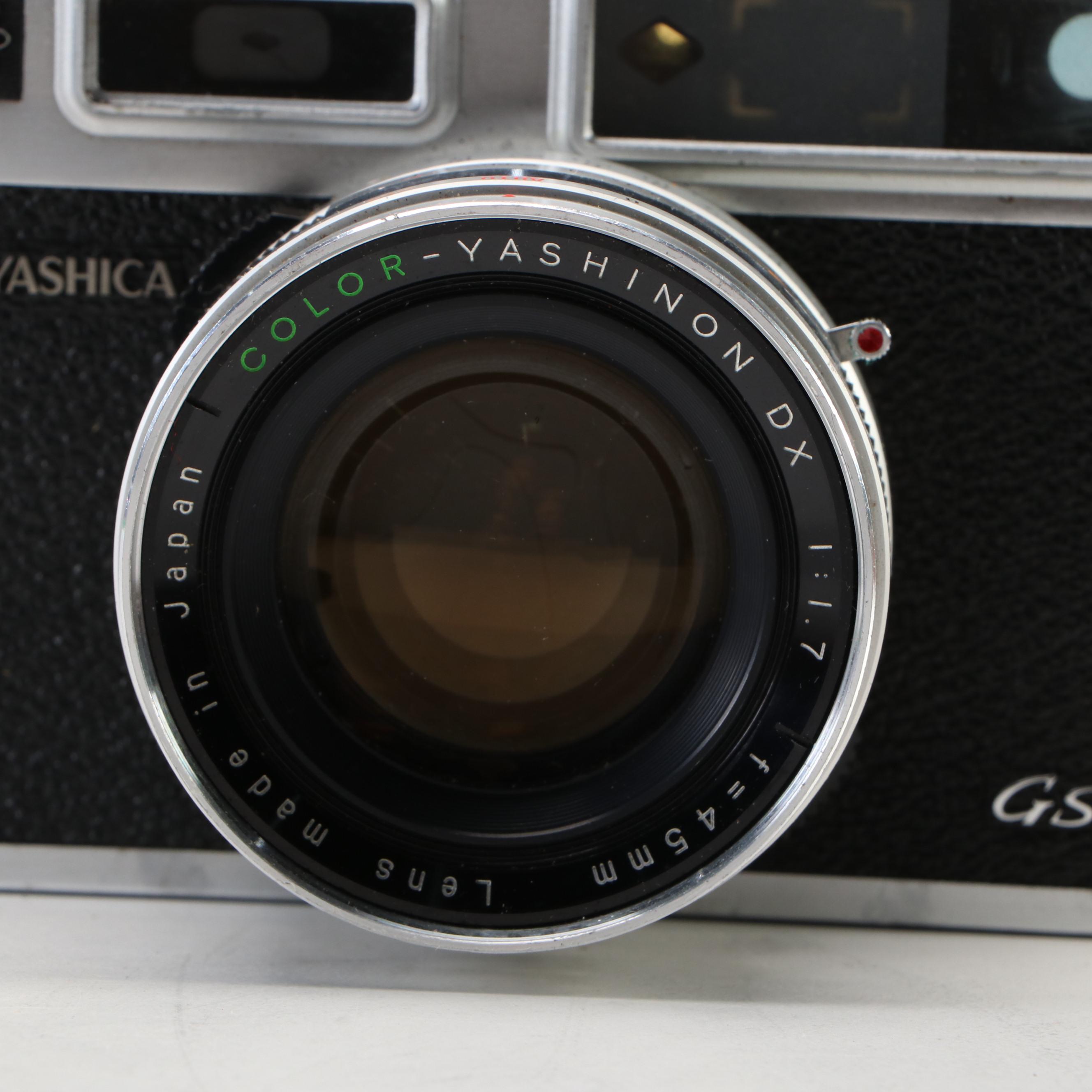 Kodak Motormatic 35F and Yashica Electro 35 with Leather Cases