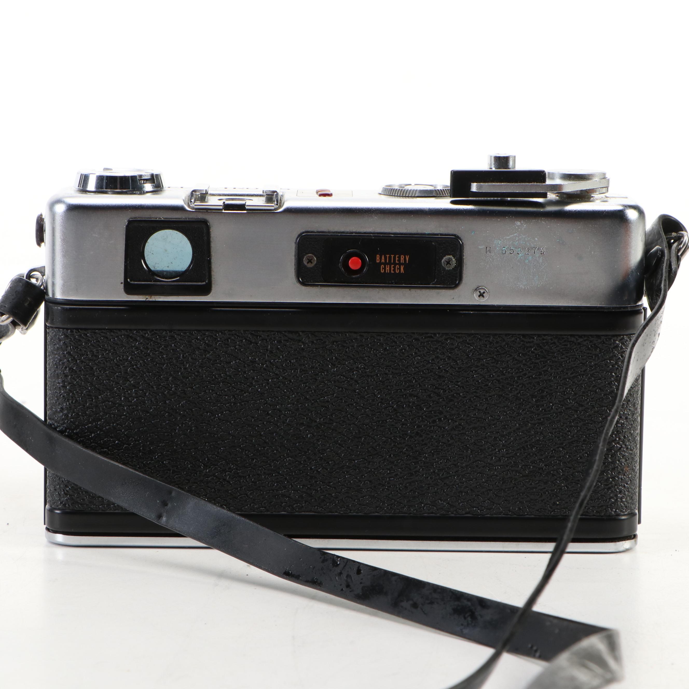 Kodak Motormatic 35F and Yashica Electro 35 with Leather Cases