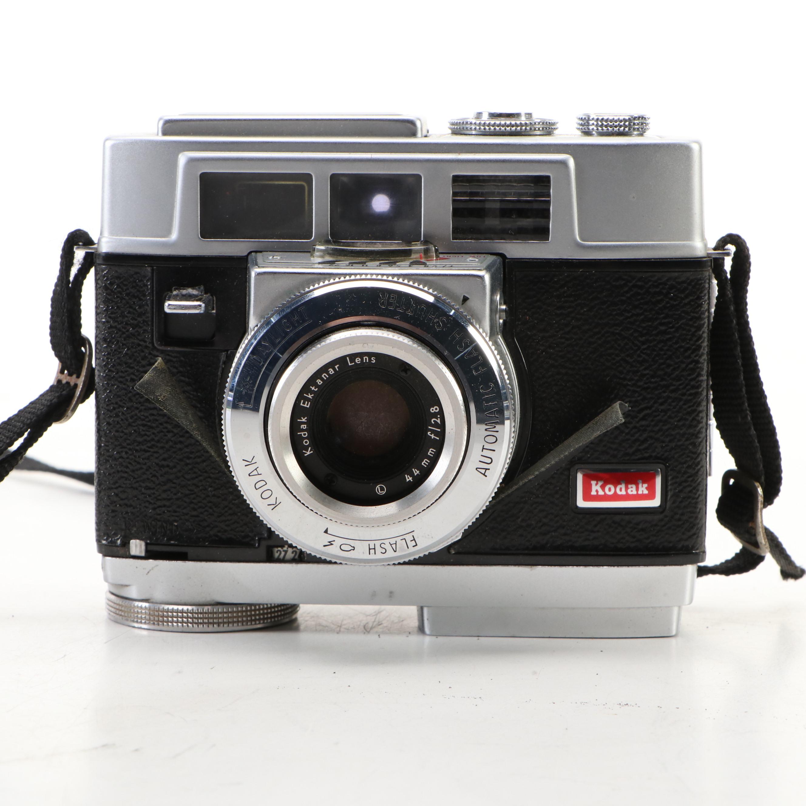 Kodak Motormatic 35F and Yashica Electro 35 with Leather Cases