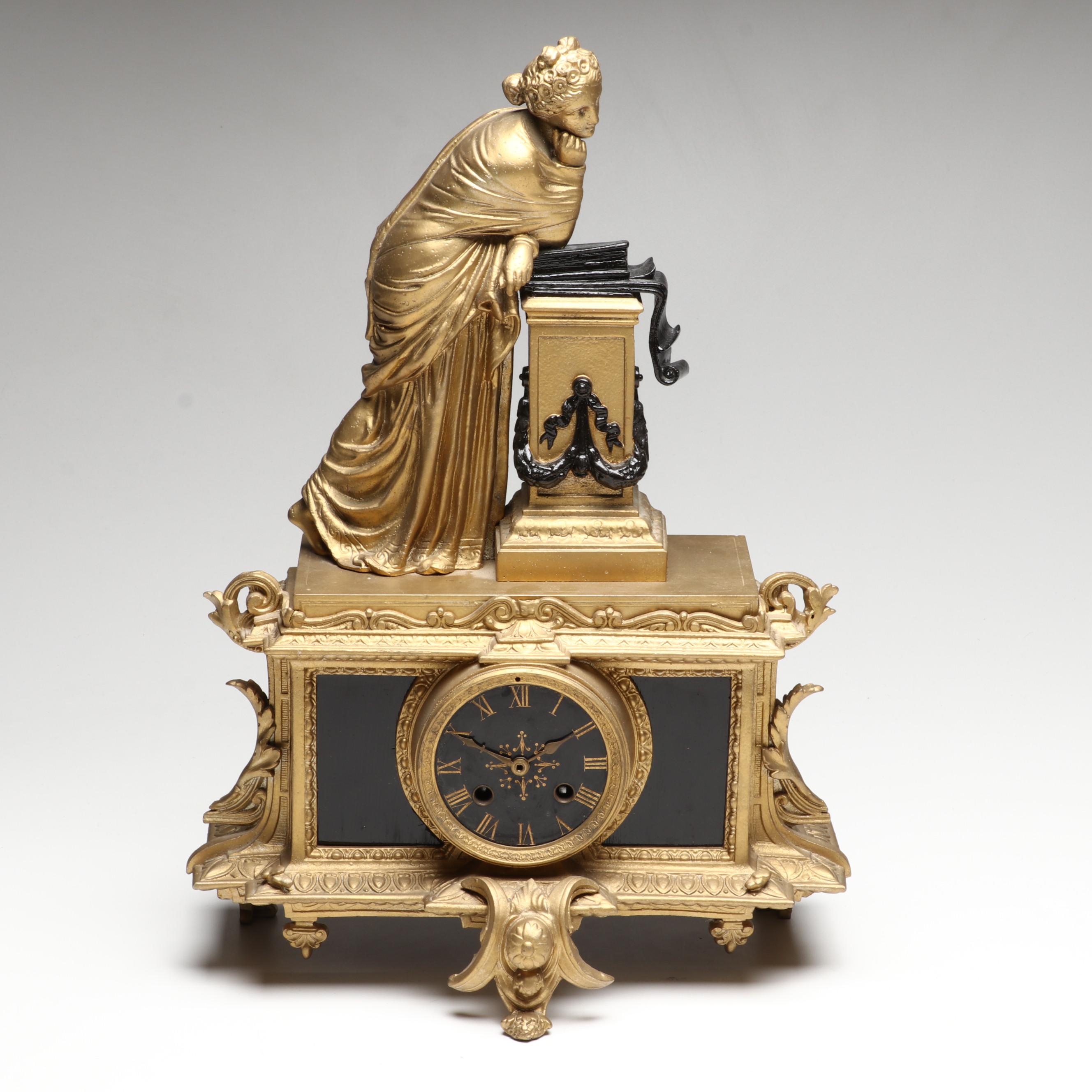 Brunfaut French Empire Style Gilt and Ebonized Metal Figural Mantel Clock