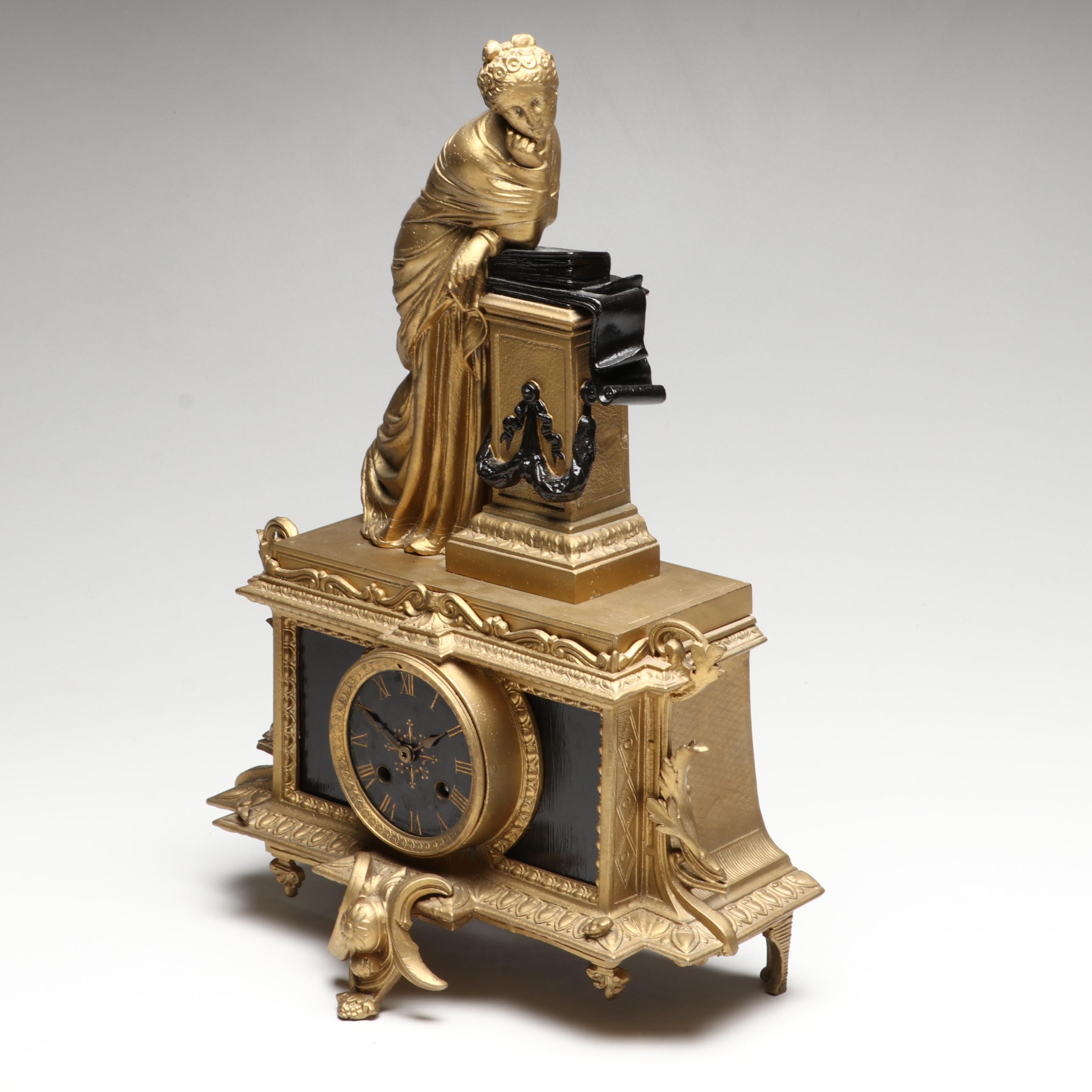 Brunfaut French Empire Style Gilt and Ebonized Metal Figural Mantel Clock