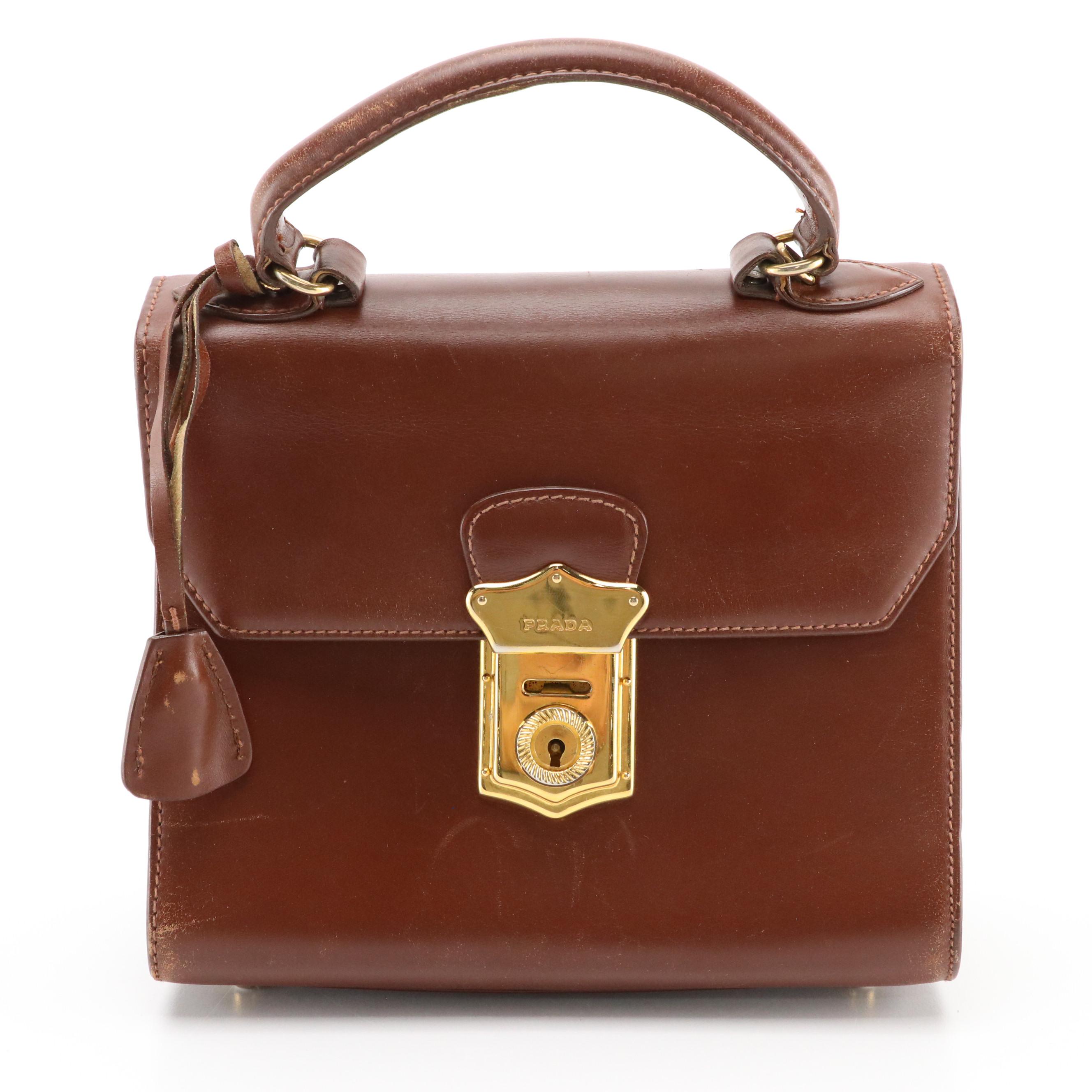 Prada Top Handle Lockable Handbag in Brown Leather