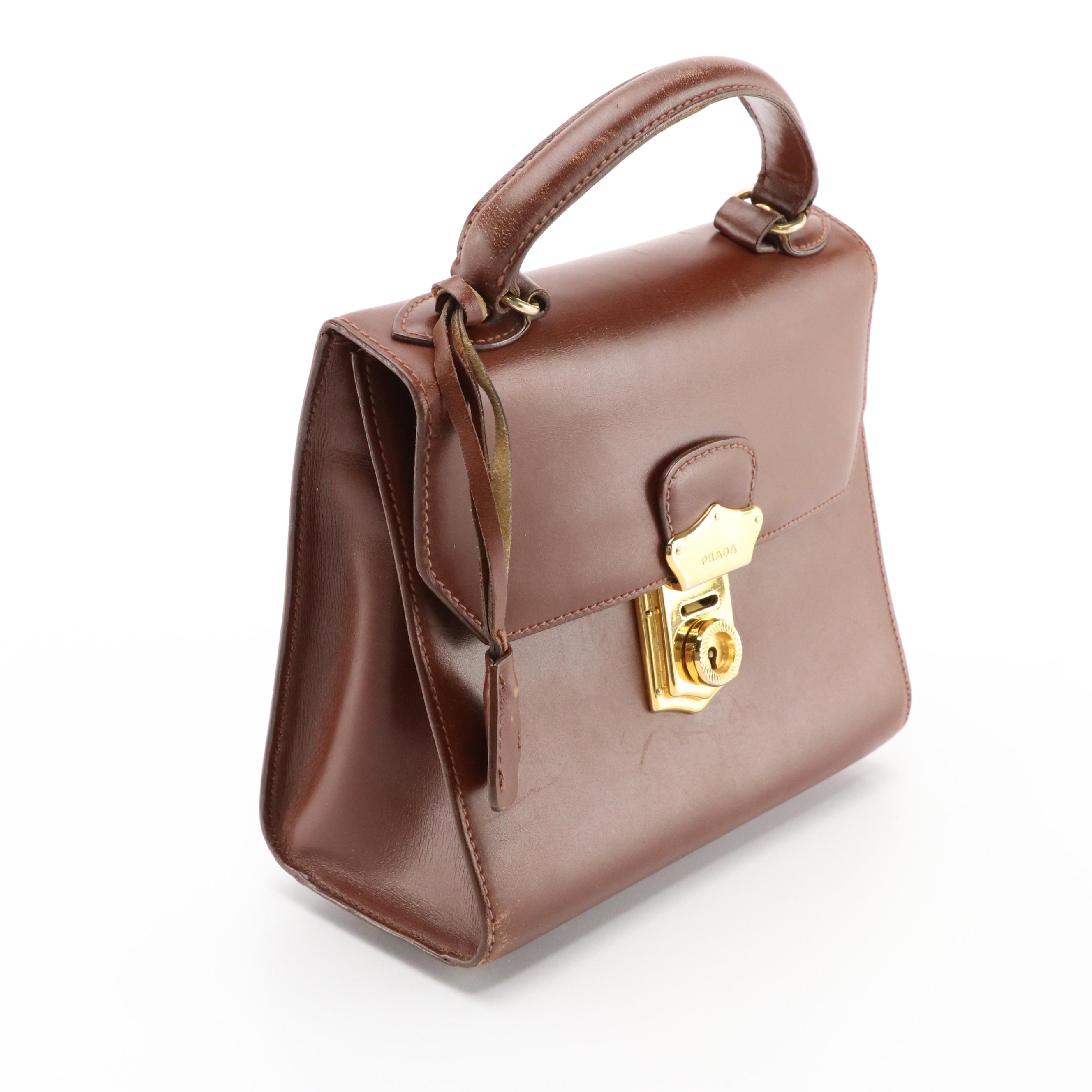 Prada Top Handle Lockable Handbag in Brown Leather