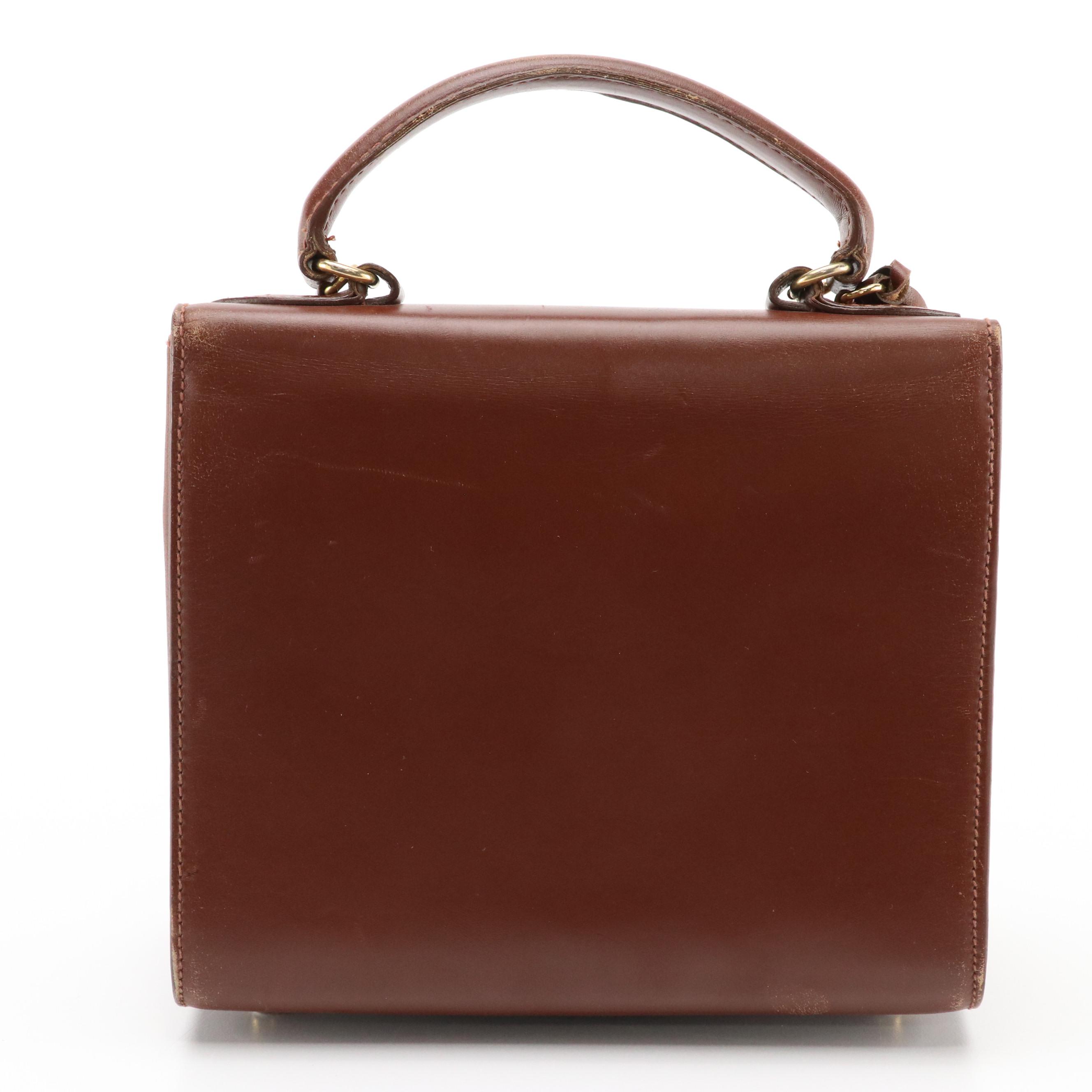 Prada Top Handle Lockable Handbag in Brown Leather