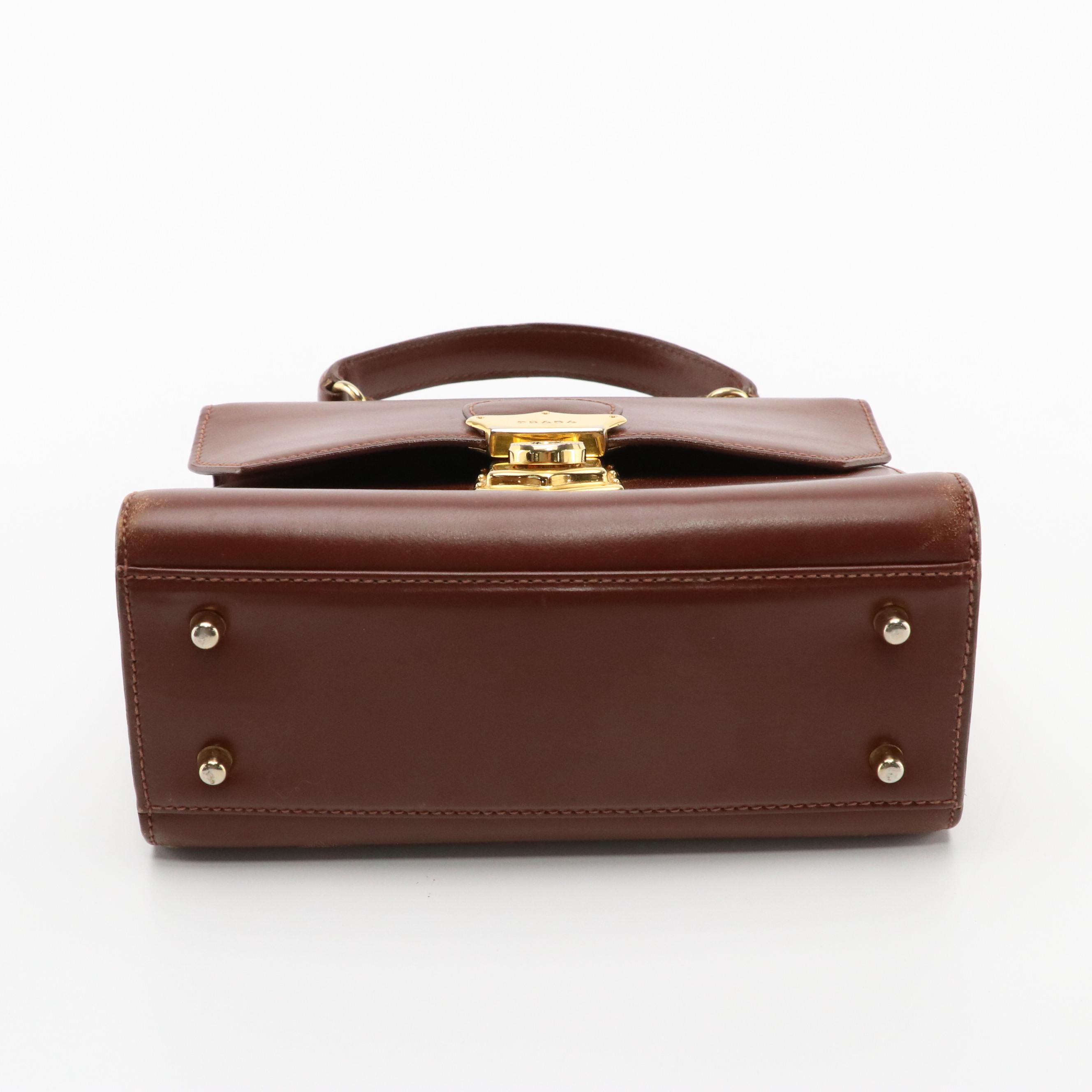 Prada Top Handle Lockable Handbag in Brown Leather