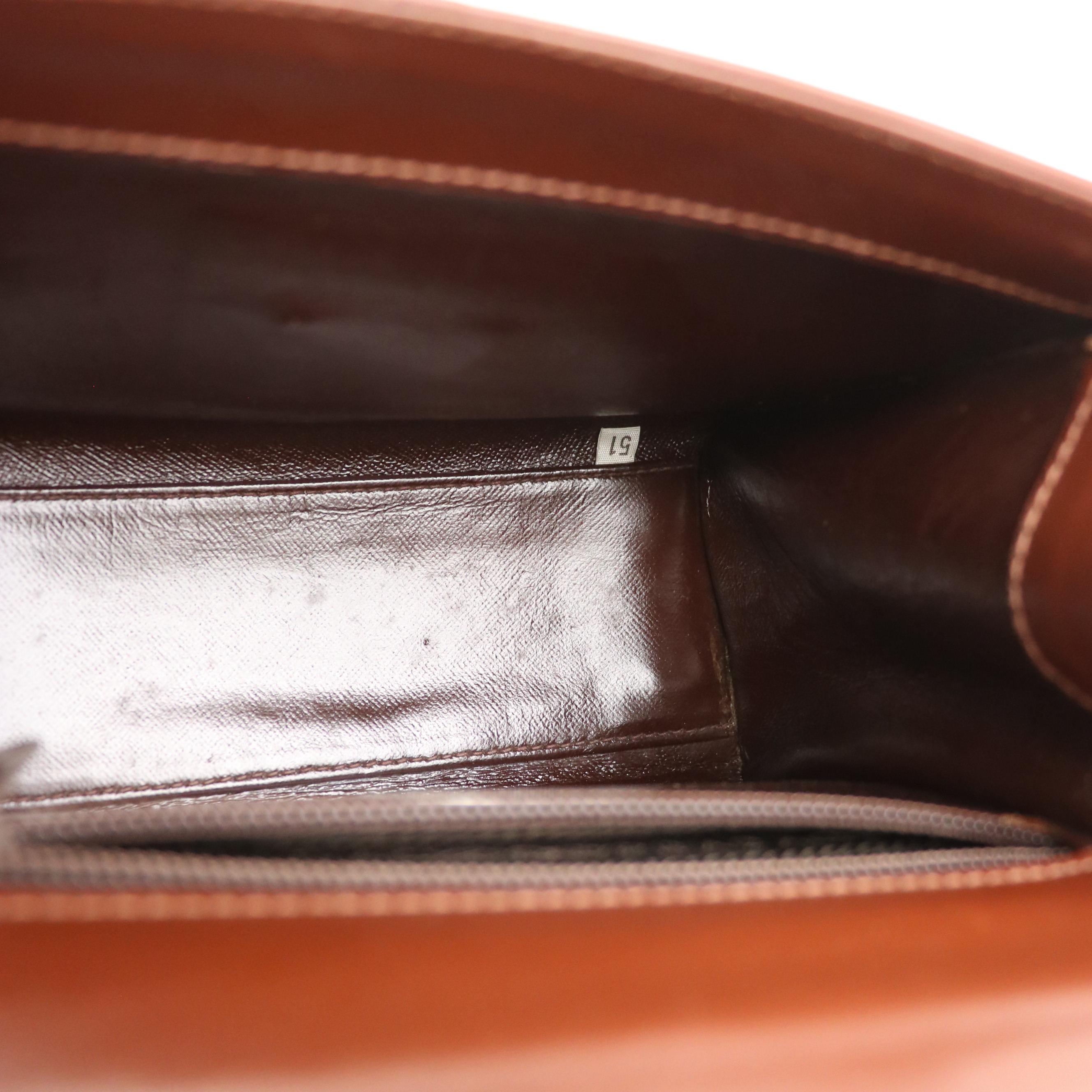 Prada Top Handle Lockable Handbag in Brown Leather